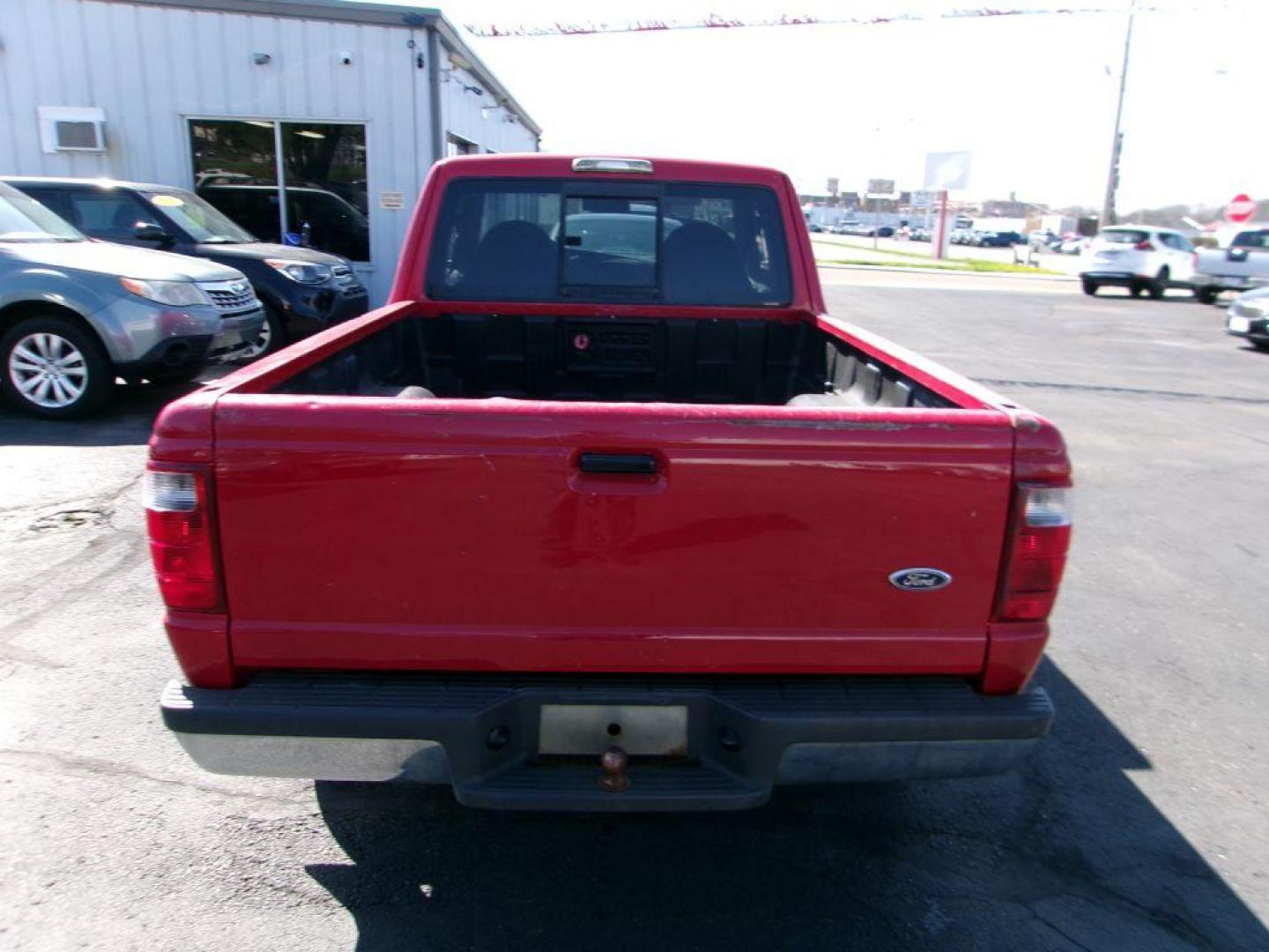 2001 RED FORD RANGER SUPER CAB (1FTYR14U71T) with an 3.0L engine, Automatic transmission, located at 501 E. Columbia St., Springfield, OH, 45503, (800) 262-7122, 39.925262, -83.801796 - *** Local Trade in *** Serviced and Detailed *** Power Windows and Locks *** Bedliner *** Sliding Rear Window *** 4 Door *** 3.0L V6 *** Jay North Auto has offered hand picked vehicles since 1965! Our customer's enjoy a NO pressure buying experience with a small town feel. All of our vehicles g - Photo#6