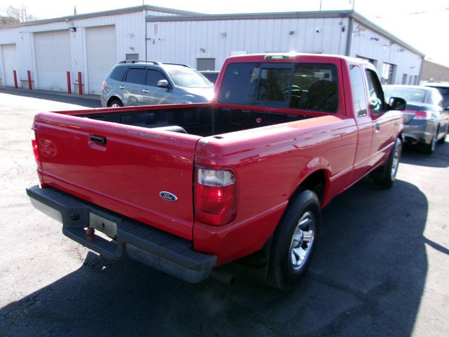2001 RED FORD RANGER SUPER CAB (1FTYR14U71T) with an 3.0L engine, Automatic transmission, located at 501 E. Columbia St., Springfield, OH, 45503, (800) 262-7122, 39.925262, -83.801796 - *** Local Trade in *** Serviced and Detailed *** Power Windows and Locks *** Bedliner *** Sliding Rear Window *** 4 Door *** 3.0L V6 *** Jay North Auto has offered hand picked vehicles since 1965! Our customer's enjoy a NO pressure buying experience with a small town feel. All of our vehicles g - Photo#8