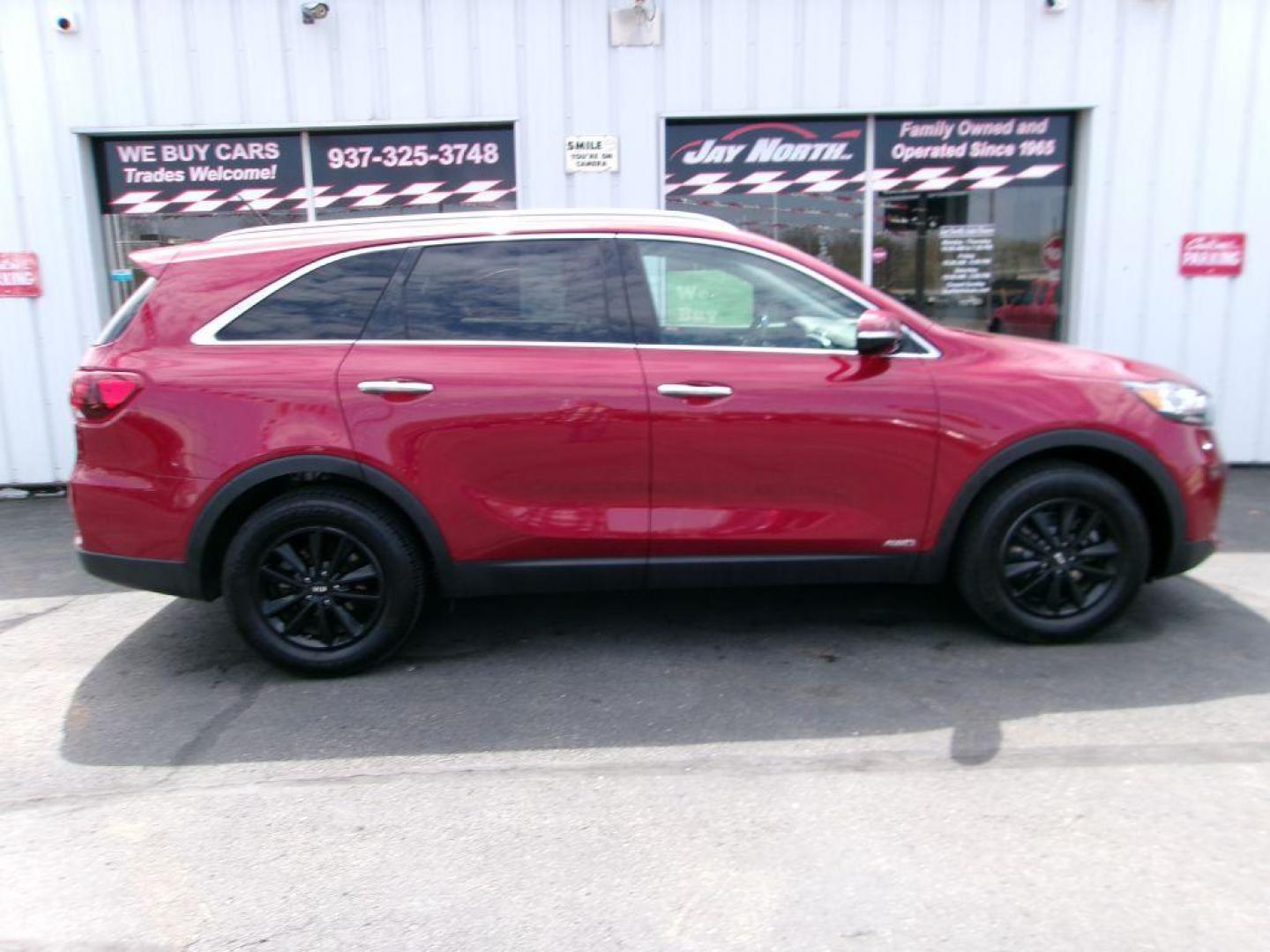 2020 RED KIA SORENTO LX CONVENIENCE (5XYPGDA39LG) with an 2.4L engine, Automatic transmission, located at 501 E. Columbia St., Springfield, OH, 45503, (800) 262-7122, 39.925262, -83.801796 - ***AWD***Android Auto and Apple CarPlay***Blind Spot***3rd Row Seating***New Front Brake Pads and Rotors***Serviced and Detailed*** Jay North Auto has offered hand picked vehicles since 1965! Our customer's enjoy a NO pressure buying experience with a small town feel. All of our vehicles get - Photo#0