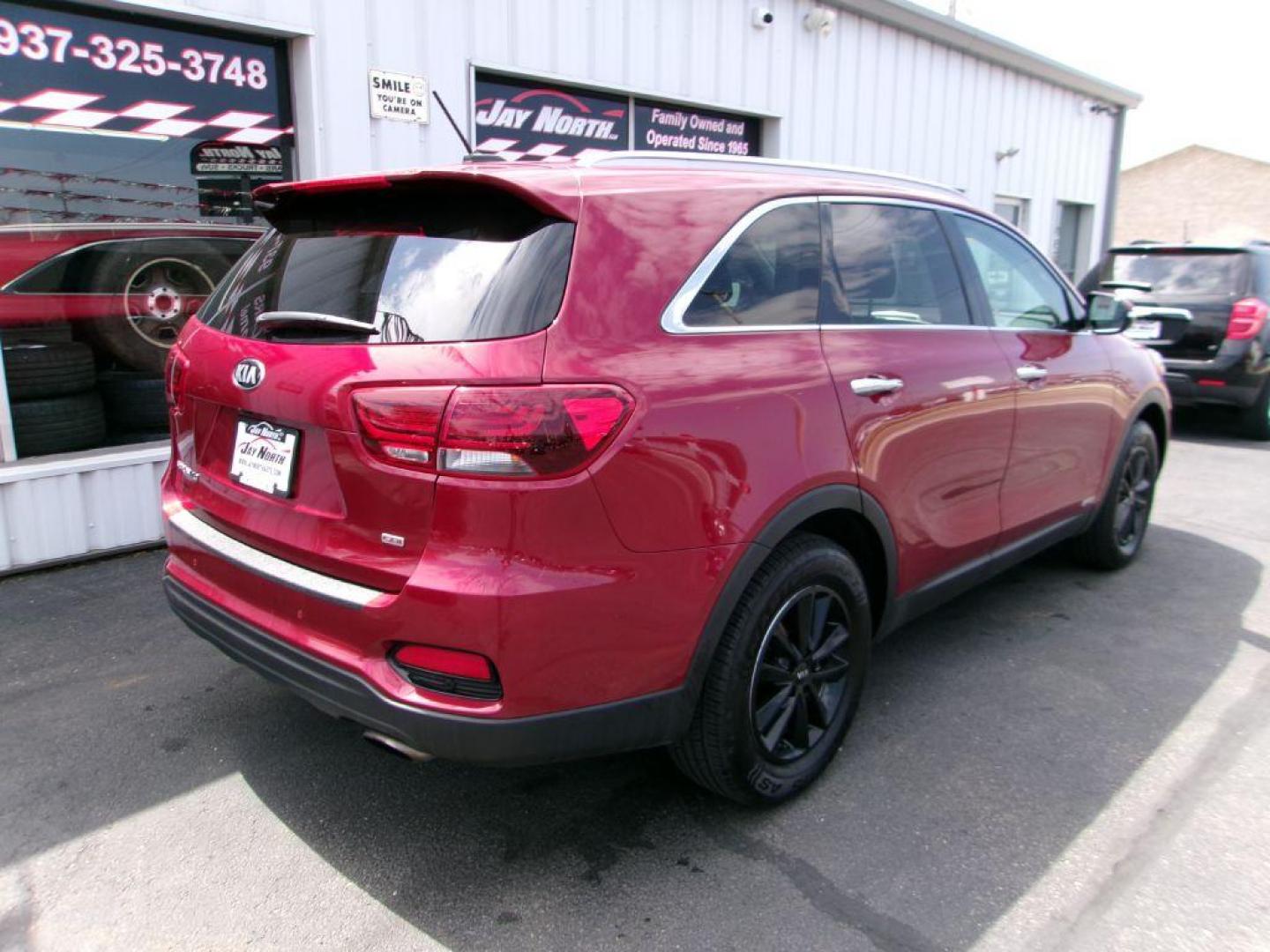 2020 RED KIA SORENTO LX CONVENIENCE (5XYPGDA39LG) with an 2.4L engine, Automatic transmission, located at 501 E. Columbia St., Springfield, OH, 45503, (800) 262-7122, 39.925262, -83.801796 - ***AWD***Android Auto and Apple CarPlay***Blind Spot***3rd Row Seating***New Front Brake Pads and Rotors***Serviced and Detailed*** Jay North Auto has offered hand picked vehicles since 1965! Our customer's enjoy a NO pressure buying experience with a small town feel. All of our vehicles get - Photo#3