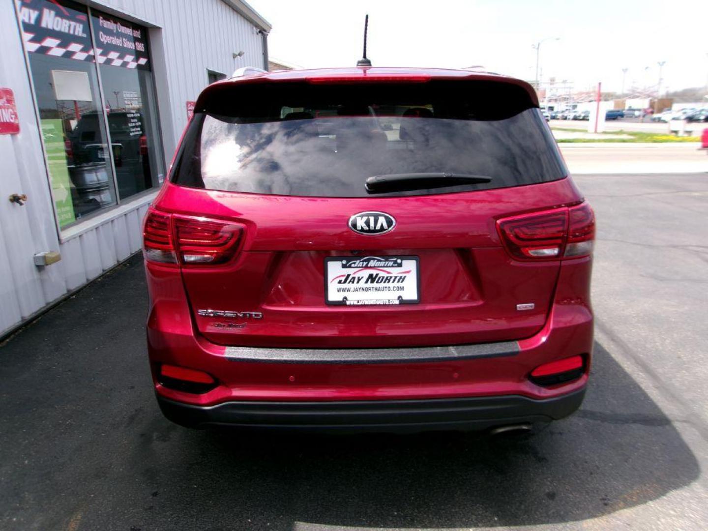 2020 RED KIA SORENTO LX CONVENIENCE (5XYPGDA39LG) with an 2.4L engine, Automatic transmission, located at 501 E. Columbia St., Springfield, OH, 45503, (800) 262-7122, 39.925262, -83.801796 - ***AWD***Android Auto and Apple CarPlay***Blind Spot***3rd Row Seating***New Front Brake Pads and Rotors***Serviced and Detailed*** Jay North Auto has offered hand picked vehicles since 1965! Our customer's enjoy a NO pressure buying experience with a small town feel. All of our vehicles get - Photo#4