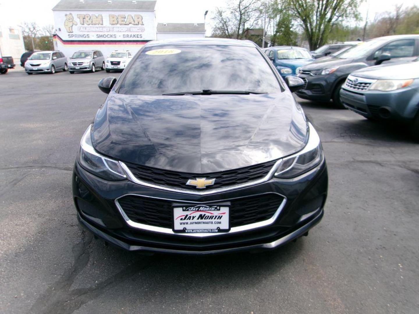 2018 BLACK CHEVROLET CRUZE LT (1G1BE5SM3J7) with an 1.4L engine, Automatic transmission, located at 501 E. Columbia St., Springfield, OH, 45503, (800) 262-7122, 39.925262, -83.801796 - ***Clean Carfax***LT***New Front and Rear Brake Pads and Rotors***Moonroof***Serviced and Detailed*** Jay North Auto has offered hand picked vehicles since 1965! Our customer's enjoy a NO pressure buying experience with a small town feel. All of our vehicles get fully inspected and detailed. W - Photo#1
