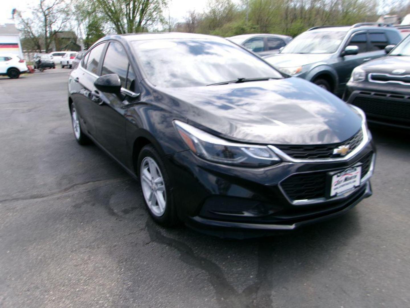 2018 BLACK CHEVROLET CRUZE LT (1G1BE5SM3J7) with an 1.4L engine, Automatic transmission, located at 501 E. Columbia St., Springfield, OH, 45503, (800) 262-7122, 39.925262, -83.801796 - ***Clean Carfax***LT***New Front and Rear Brake Pads and Rotors***Moonroof***Serviced and Detailed*** Jay North Auto has offered hand picked vehicles since 1965! Our customer's enjoy a NO pressure buying experience with a small town feel. All of our vehicles get fully inspected and detailed. W - Photo#2