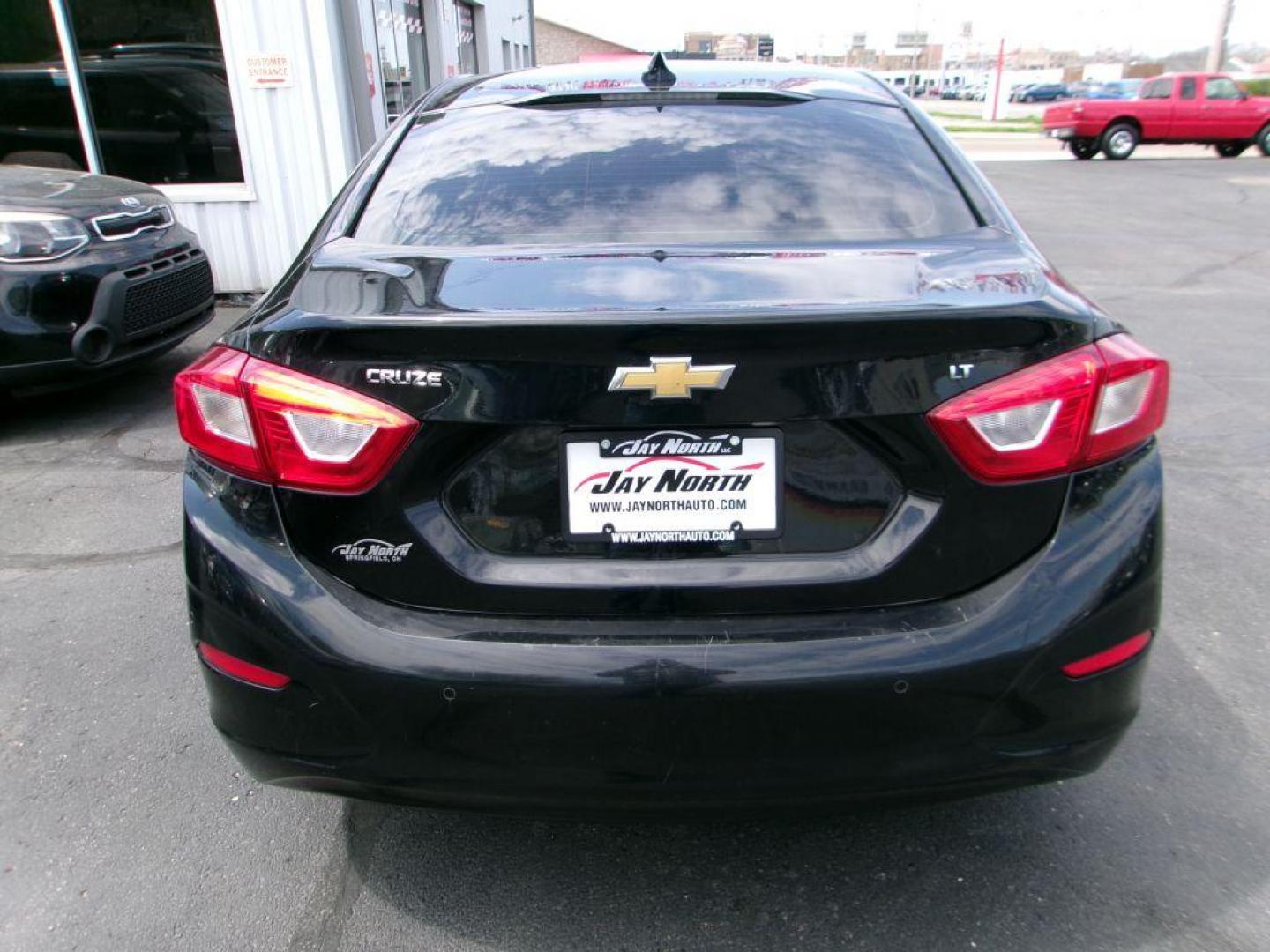 2018 BLACK CHEVROLET CRUZE LT (1G1BE5SM3J7) with an 1.4L engine, Automatic transmission, located at 501 E. Columbia St., Springfield, OH, 45503, (800) 262-7122, 39.925262, -83.801796 - ***Clean Carfax***LT***New Front and Rear Brake Pads and Rotors***Moonroof***Serviced and Detailed*** Jay North Auto has offered hand picked vehicles since 1965! Our customer's enjoy a NO pressure buying experience with a small town feel. All of our vehicles get fully inspected and detailed. W - Photo#4