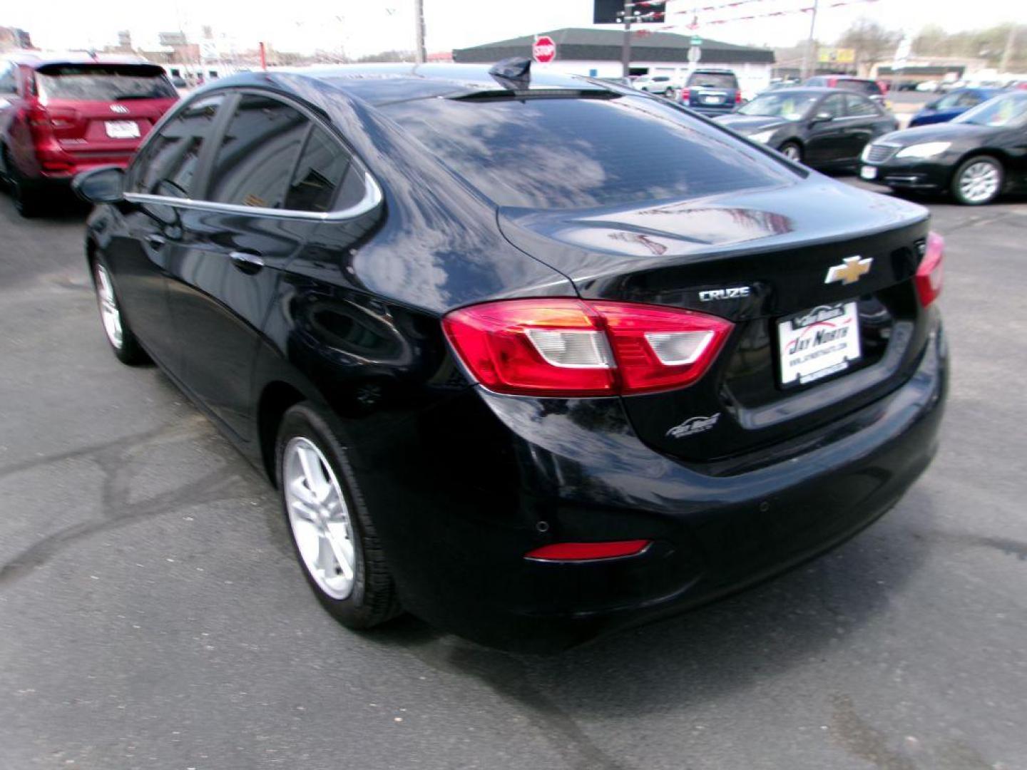 2018 BLACK CHEVROLET CRUZE LT (1G1BE5SM3J7) with an 1.4L engine, Automatic transmission, located at 501 E. Columbia St., Springfield, OH, 45503, (800) 262-7122, 39.925262, -83.801796 - ***Clean Carfax***LT***New Front and Rear Brake Pads and Rotors***Moonroof***Serviced and Detailed*** Jay North Auto has offered hand picked vehicles since 1965! Our customer's enjoy a NO pressure buying experience with a small town feel. All of our vehicles get fully inspected and detailed. W - Photo#5