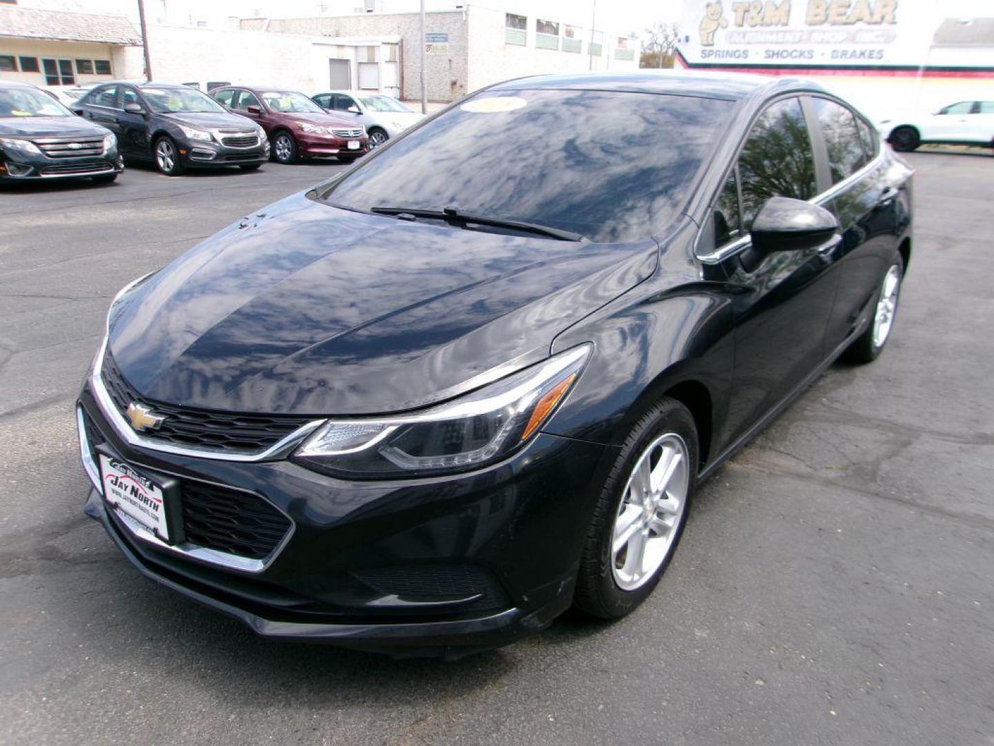2018 BLACK CHEVROLET CRUZE LT (1G1BE5SM3J7) with an 1.4L engine, Automatic transmission, located at 501 E. Columbia St., Springfield, OH, 45503, (800) 262-7122, 39.925262, -83.801796 - ***Clean Carfax***LT***New Front and Rear Brake Pads and Rotors***Moonroof***Serviced and Detailed*** Jay North Auto has offered hand picked vehicles since 1965! Our customer's enjoy a NO pressure buying experience with a small town feel. All of our vehicles get fully inspected and detailed. W - Photo#6
