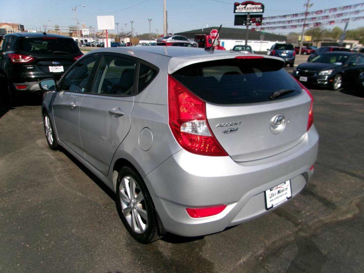 2013 SILVER HYUNDAI ACCENT SE (KMHCU5AE6DU) with an 1.6L engine, Automatic transmission, located at 501 E. Columbia St., Springfield, OH, 45503, (800) 262-7122, 39.925262, -83.801796 - ***Clean Carfax***SE***New Tires***Sunroof***New Front Pads and Rotors***Serviced and Detailed*** Jay North Auto has offered hand picked vehicles since 1965! Our customer's enjoy a NO pressure buying experience with a small town feel. All of our vehicles get fully inspected and detailed. We ar - Photo#5