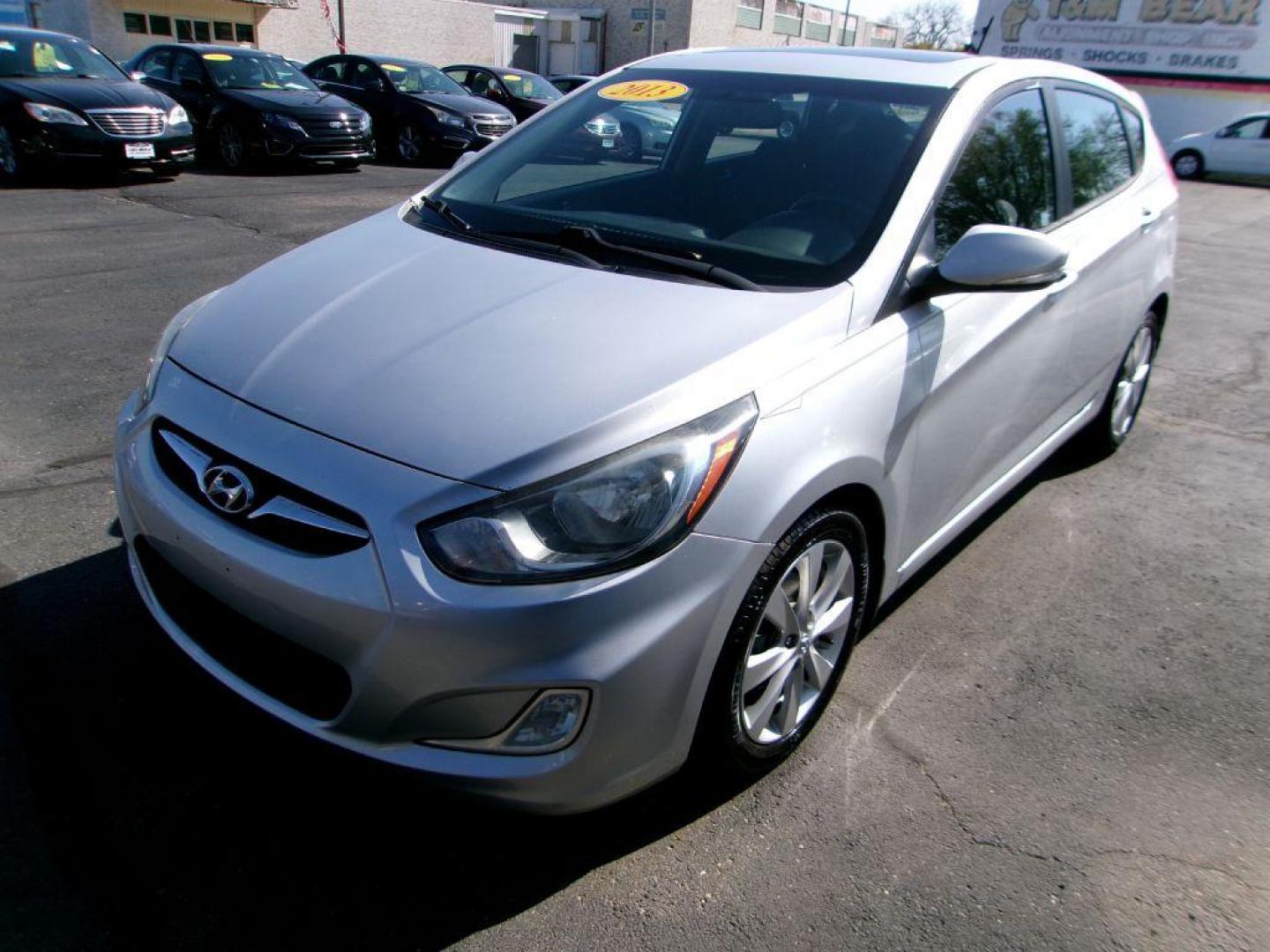 2013 SILVER HYUNDAI ACCENT SE (KMHCU5AE6DU) with an 1.6L engine, Automatic transmission, located at 501 E. Columbia St., Springfield, OH, 45503, (800) 262-7122, 39.925262, -83.801796 - ***Clean Carfax***SE***New Tires***Sunroof***New Front Pads and Rotors***Serviced and Detailed*** Jay North Auto has offered hand picked vehicles since 1965! Our customer's enjoy a NO pressure buying experience with a small town feel. All of our vehicles get fully inspected and detailed. We ar - Photo#6