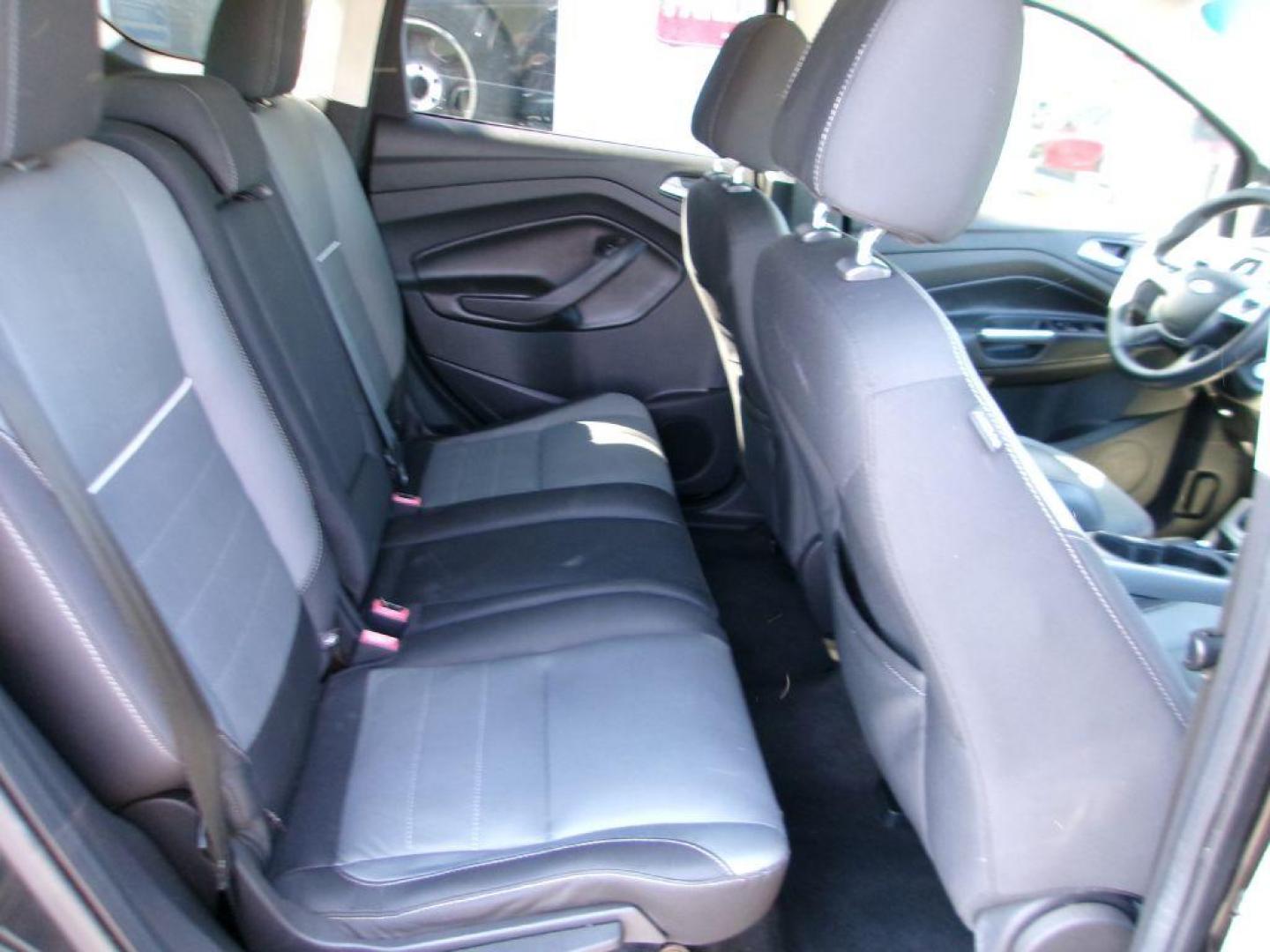 2015 BLACK FORD ESCAPE SE (1FMCU0G72FU) with an 2.5L engine, Automatic transmission, located at 501 E. Columbia St., Springfield, OH, 45503, (800) 262-7122, 39.925262, -83.801796 - ***New Tires***New Front and Rear Brake Pads and Rotors***New Battery***New Spark Plugs***Serviced and Detailed*** Jay North Auto has offered hand picked vehicles since 1965! Our customer's enjoy a NO pressure buying experience with a small town feel. All of our vehicles get fully inspected an - Photo#14