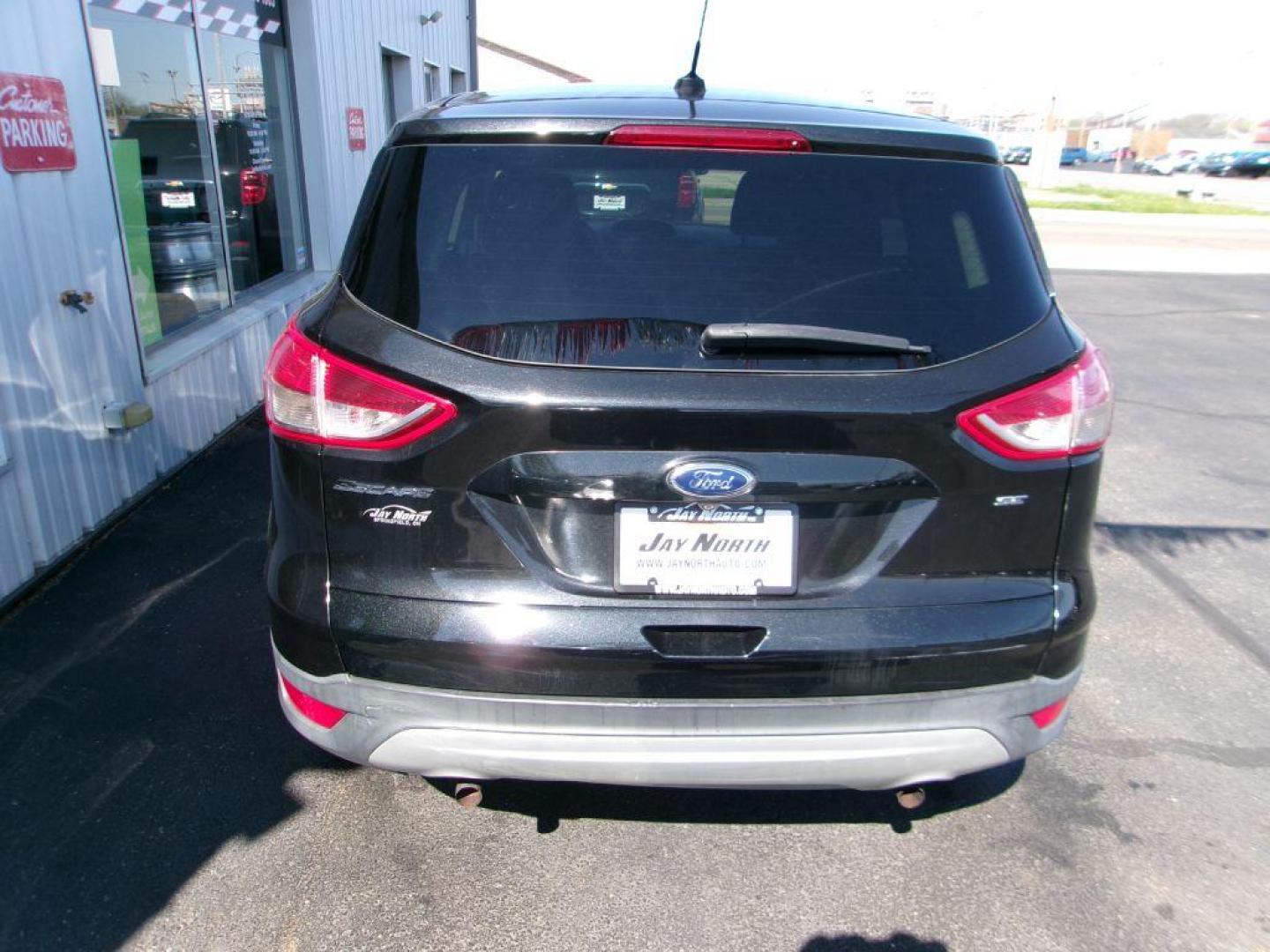 2015 BLACK FORD ESCAPE SE (1FMCU0G72FU) with an 2.5L engine, Automatic transmission, located at 501 E. Columbia St., Springfield, OH, 45503, (800) 262-7122, 39.925262, -83.801796 - ***New Tires***New Front and Rear Brake Pads and Rotors***New Battery***New Spark Plugs***Serviced and Detailed*** Jay North Auto has offered hand picked vehicles since 1965! Our customer's enjoy a NO pressure buying experience with a small town feel. All of our vehicles get fully inspected an - Photo#4