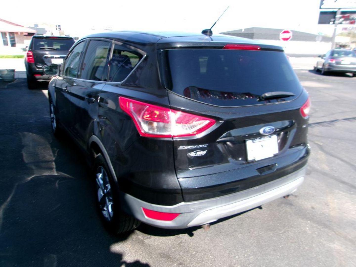 2015 BLACK FORD ESCAPE SE (1FMCU0G72FU) with an 2.5L engine, Automatic transmission, located at 501 E. Columbia St., Springfield, OH, 45503, (800) 262-7122, 39.925262, -83.801796 - ***New Tires***New Front and Rear Brake Pads and Rotors***New Battery***New Spark Plugs***Serviced and Detailed*** Jay North Auto has offered hand picked vehicles since 1965! Our customer's enjoy a NO pressure buying experience with a small town feel. All of our vehicles get fully inspected an - Photo#5