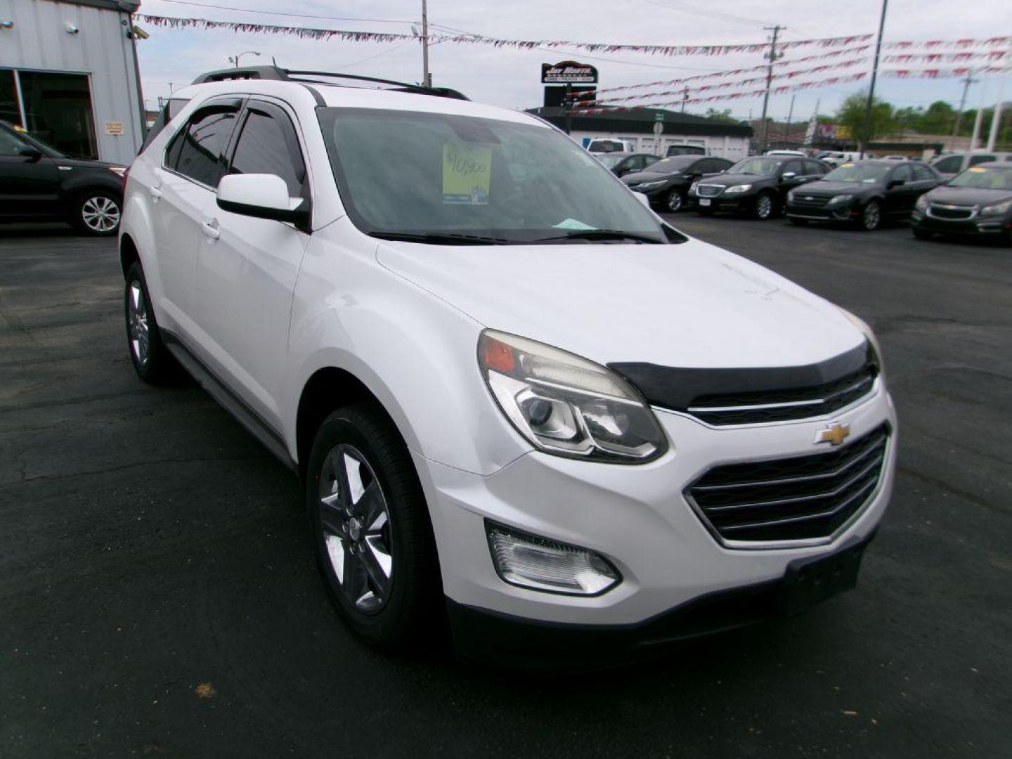 2016 WHITE CHEVROLET EQUINOX LT (2GNALCEKXG6) with an 2.4L engine, Automatic transmission, located at 501 E. Columbia St., Springfield, OH, 45503, (800) 262-7122, 39.925262, -83.801796 - *** Clean CarFax *** Serviced and Detailed *** FWD *** LT *** Remote Start *** Moonroof *** NICE *** Jay North Auto has offered hand picked vehicles since 1965! Our customer's enjoy a NO pressure buying experience with a small town feel. All of our vehicles get fully inspected and detailed. We - Photo#2