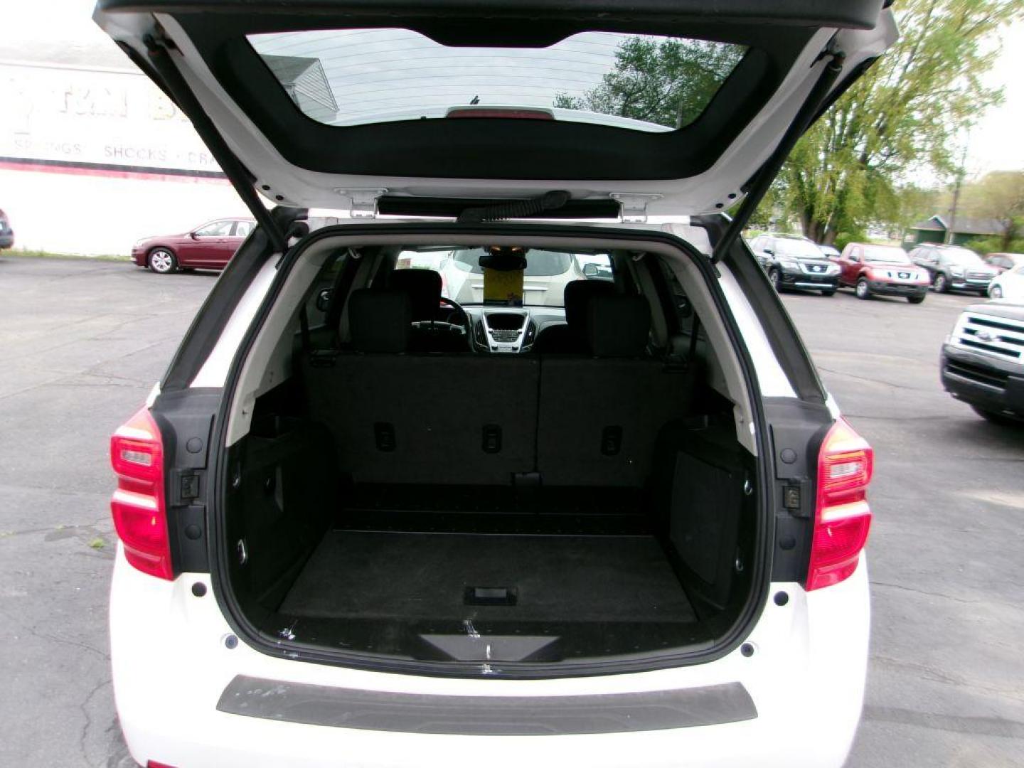 2016 WHITE CHEVROLET EQUINOX LT (2GNALCEKXG6) with an 2.4L engine, Automatic transmission, located at 501 E. Columbia St., Springfield, OH, 45503, (800) 262-7122, 39.925262, -83.801796 - *** Clean CarFax *** Serviced and Detailed *** FWD *** LT *** Remote Start *** Moonroof *** NICE *** Jay North Auto has offered hand picked vehicles since 1965! Our customer's enjoy a NO pressure buying experience with a small town feel. All of our vehicles get fully inspected and detailed. We - Photo#4