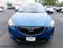 2014 BLUE MAZDA CX-5 TOURING (JM3KE4CY3E0) with an 2.5L engine, Automatic transmission, located at 501 E. Columbia St., Springfield, OH, 45503, (800) 262-7122, 39.925262, -83.801796 - ***Only 81K Miles***AWD***New Tires***New Rear Brake Pads and Rotors***New Battery***Sunroof***BOSE Sound system***Back-up Camera***Serviced and Detailed*** Jay North Auto has offered hand picked vehicles since 1965! Our customer's enjoy a NO pressure buying experience with a small town feel. Al - Photo#2