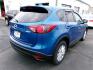 2014 BLUE MAZDA CX-5 TOURING (JM3KE4CY3E0) with an 2.5L engine, Automatic transmission, located at 501 E. Columbia St., Springfield, OH, 45503, (800) 262-7122, 39.925262, -83.801796 - ***Only 81K Miles***AWD***New Tires***New Rear Brake Pads and Rotors***New Battery***Sunroof***BOSE Sound system***Back-up Camera***Serviced and Detailed*** Jay North Auto has offered hand picked vehicles since 1965! Our customer's enjoy a NO pressure buying experience with a small town feel. Al - Photo#6