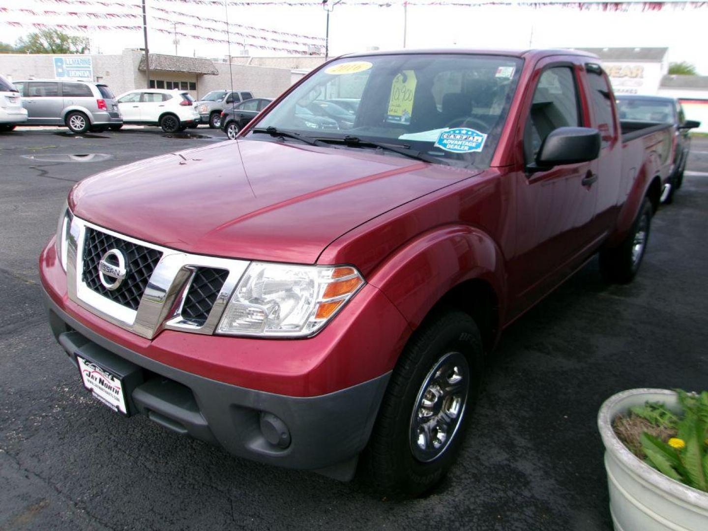 2016 RED NISSAN FRONTIER S (1N6BD0CTXGN) with an 2.5L engine, Automatic transmission, located at 501 E. Columbia St., Springfield, OH, 45503, (800) 262-7122, 39.925262, -83.801796 - ***Clean Carfax***Ext Cab***S***Serviced and Detailed*** Spray In liner *** 2.5L *** Jay North Auto has offered hand picked vehicles since 1965! Our customer's enjoy a NO pressure buying experience with a small town feel. All of our vehicles get fully inspected and detailed. We are a preferred - Photo#3
