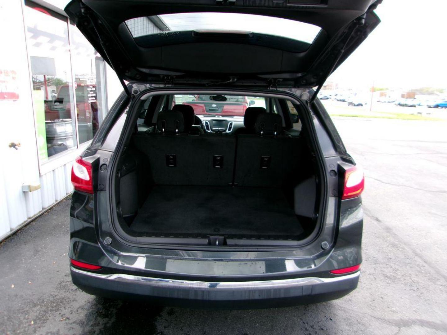 2018 GRAY CHEVROLET EQUINOX LT (2GNAXSEV3J6) with an 1.5L engine, Automatic transmission, located at 501 E. Columbia St., Springfield, OH, 45503, (800) 262-7122, 39.925262, -83.801796 - ***Clean Carfax***AWD***New Battery***LT***Serviced and Detailed*** Jay North Auto has offered hand picked vehicles since 1965! Our customer's enjoy a NO pressure buying experience with a small town feel. All of our vehicles get fully inspected and detailed. We are a preferred dealer for many lo - Photo#7