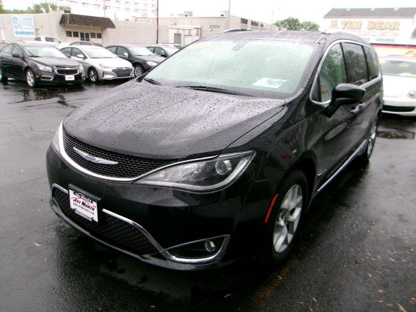 2018 BLACK CHRYSLER PACIFICA TOURING L (2C4RC1BG5JR) with an 3.6L engine, Automatic transmission, located at 501 E. Columbia St., Springfield, OH, 45503, (800) 262-7122, 39.925262, -83.801796 - *** Serviced and Detailed *** Leather *** Remote Start *** Touring L *** LOADED *** Advanced Multistage Front Airbags Driver Inflatable Knee-Bolster Airbag Passenger Inflatable Knee-Bolster Air Bag Supplemental Side-Curtain Airbags in All Rows Supplemental Front Seat-Mounted Side Airbags - Photo#3