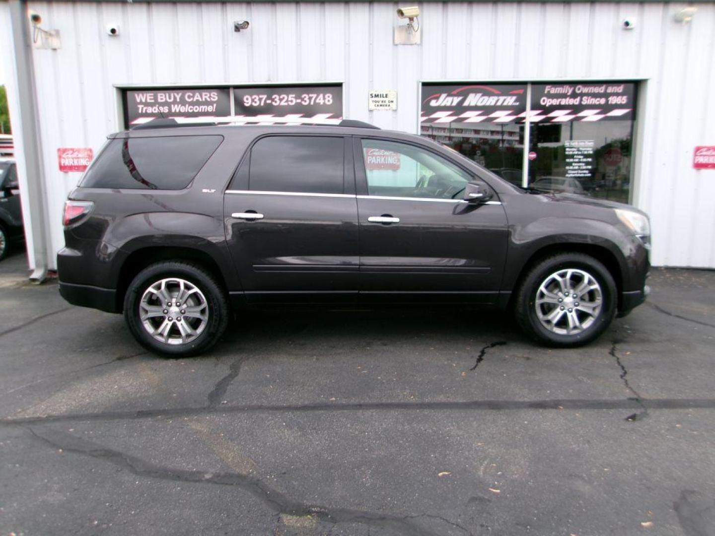 2015 GRAY GMC ACADIA SLT-1 (1GKKRRKD4FJ) with an 3.6L engine, Automatic transmission, located at 501 E. Columbia St., Springfield, OH, 45503, (800) 262-7122, 39.925262, -83.801796 - *** 1 Owner *** Clean CarFax *** V6 FWD *** Third Row *** Remote Start *** Leather *** Loaded *** Serviced and Detailed *** Jay North Auto has offered hand picked vehicles since 1965! Our customer's enjoy a NO pressure buying experience with a small town feel. All of our vehicles get fully insp - Photo#0