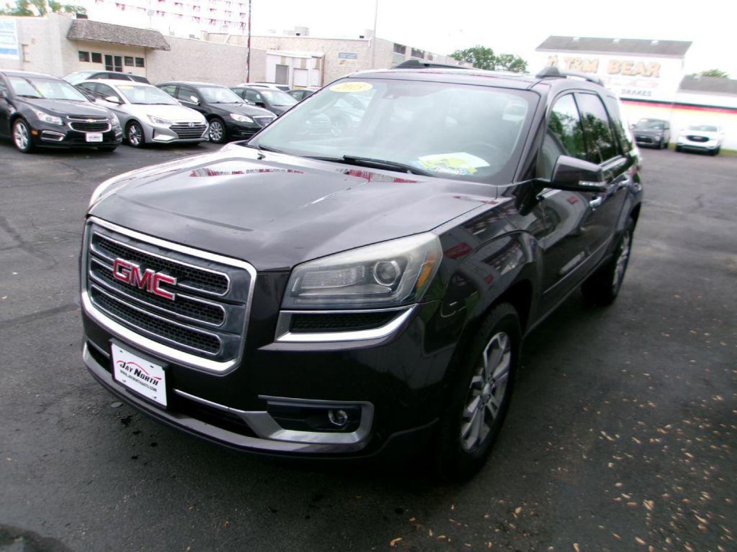 2015 GRAY GMC ACADIA SLT-1 (1GKKRRKD4FJ) with an 3.6L engine, Automatic transmission, located at 501 E. Columbia St., Springfield, OH, 45503, (800) 262-7122, 39.925262, -83.801796 - *** 1 Owner *** Clean CarFax *** V6 FWD *** Third Row *** Remote Start *** Leather *** Loaded *** Serviced and Detailed *** Jay North Auto has offered hand picked vehicles since 1965! Our customer's enjoy a NO pressure buying experience with a small town feel. All of our vehicles get fully insp - Photo#6