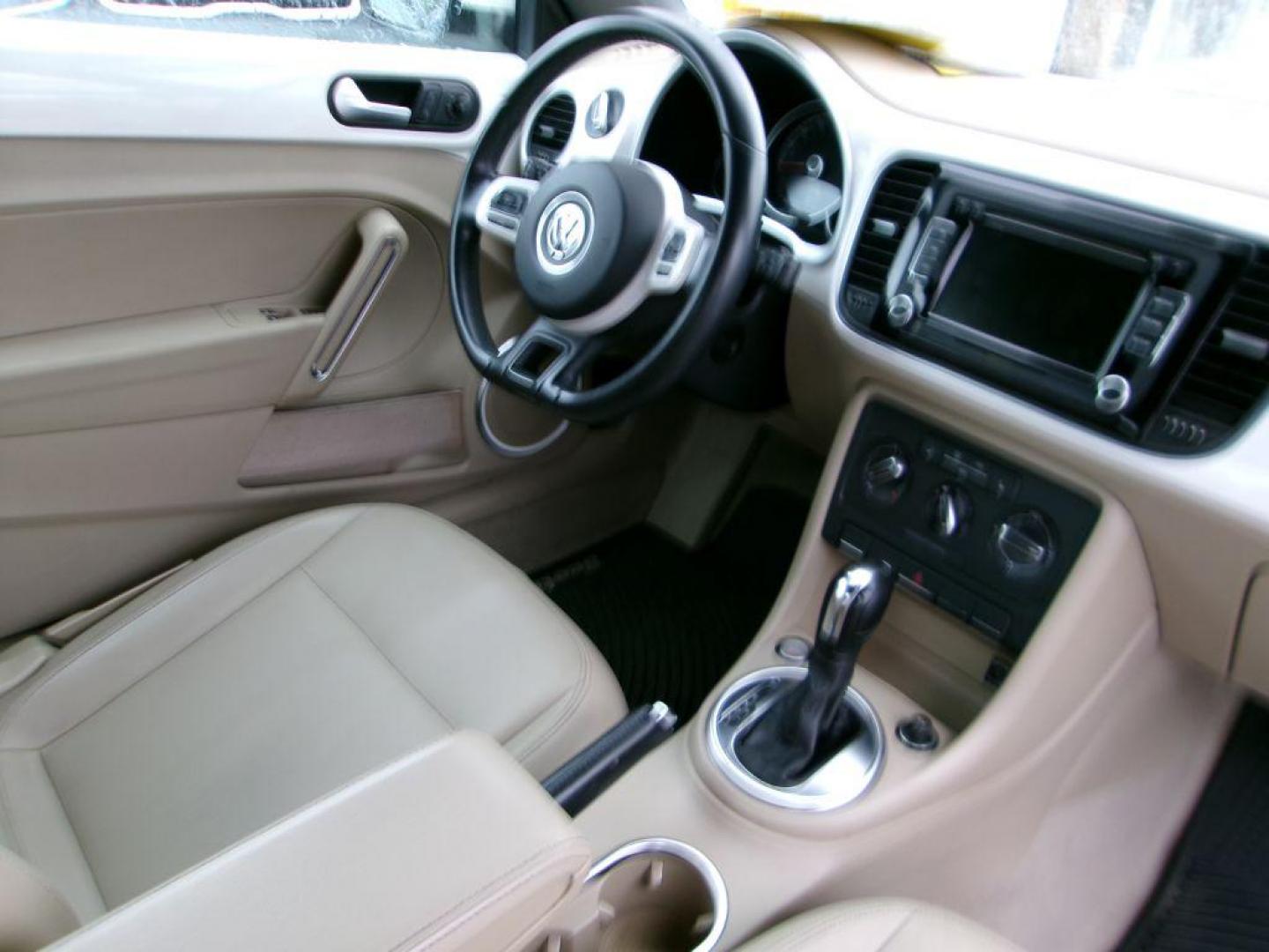 2013 WHITE VOLKSWAGEN BEETLE 2.5 (3VW5P7AT7DM) with an 2.5L engine, Automatic transmission, located at 501 E. Columbia St., Springfield, OH, 45503, (800) 262-7122, 39.925262, -83.801796 - *** 1 Owner *** Serviced and Deatiled *** Leather *** Push Button Start *** Jay North Auto has offered hand picked vehicles since 1965! Our customer's enjoy a NO pressure buying experience with a small town feel. All of our vehicles get fully inspected and detailed. We are a preferred dealer fo - Photo#7