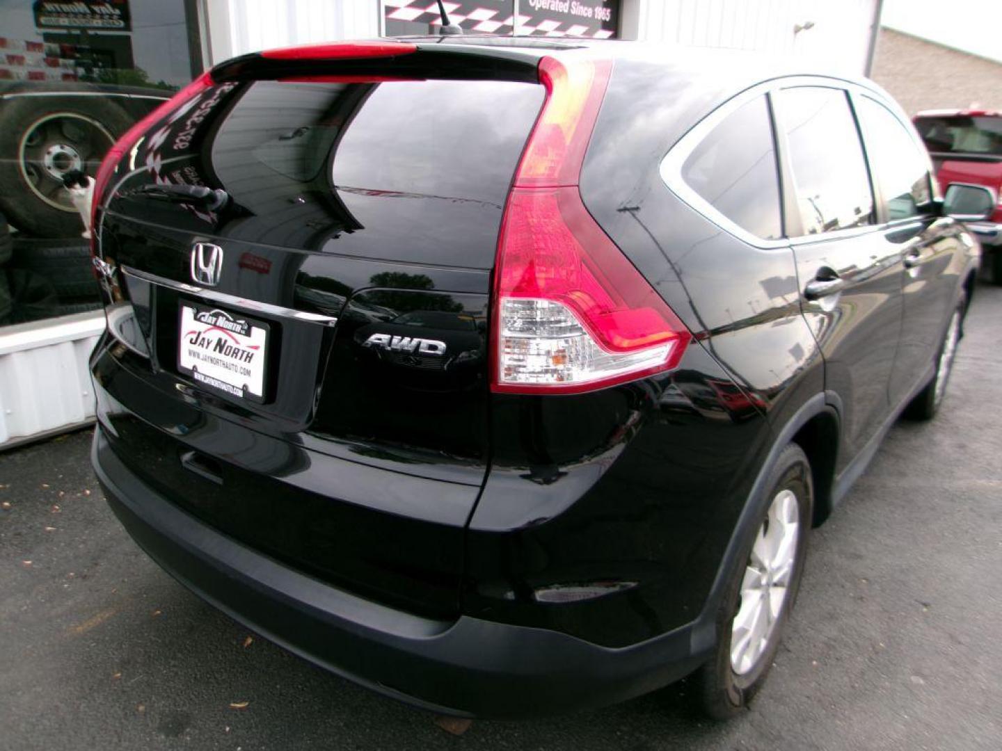 2013 BLACK HONDA CR-V EX (2HKRM4H56DH) with an 2.4L engine, Automatic transmission, located at 501 E. Columbia St., Springfield, OH, 45503, (800) 262-7122, 39.925262, -83.801796 - *** EX *** AWD *** Moonroof *** Back Up Camera *** Serviced and Detailed *** 2.4L *** NICE *** Jay North Auto has offered hand picked vehicles since 1965! Our customer's enjoy a NO pressure buying experience with a small town feel. All of our vehicles get fully inspected and detailed. We are a - Photo#5