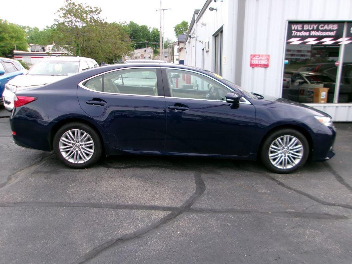 2013 BLUE LEXUS ES 350 (JTHBK1GG2D2) with an 3.5L engine, Automatic transmission, located at 501 E. Columbia St., Springfield, OH, 45503, (800) 262-7122, 39.925262, -83.801796 - *** 3.5L V6 *** Premium Audio w/ Navigation *** Moonroof *** Heated and Cooled Leather Seating *** Blind Spot *** Parking Assist ** Serviced and Detailed *** Lexus Quality #1 *** Jay North Auto has offered hand picked vehicles since 1965! Our customer's enjoy a NO pressure buying experience wit - Photo#0