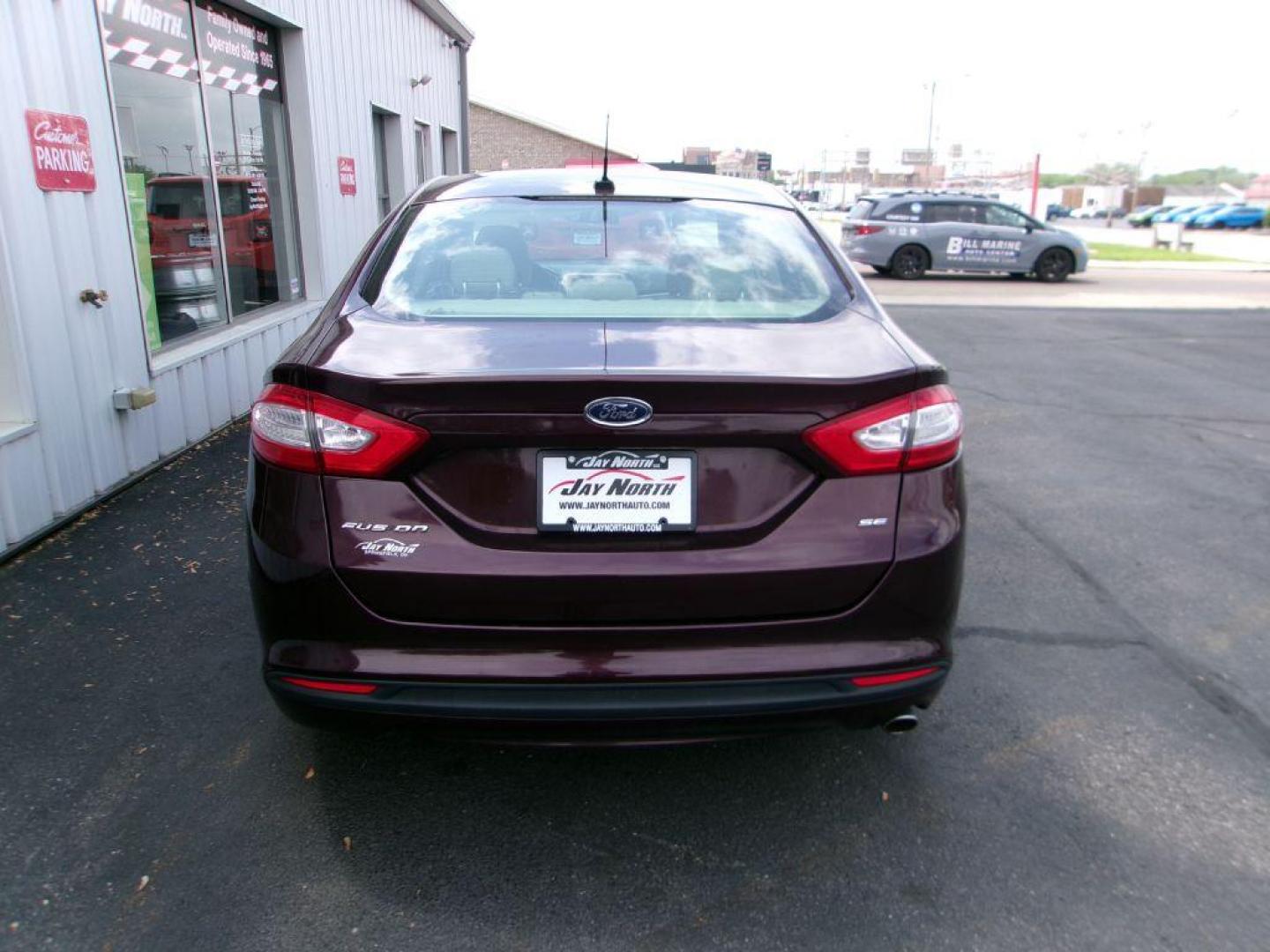 2013 RED FORD FUSION SE (3FA6P0H77DR) with an 2.5L engine, Automatic transmission, located at 501 E. Columbia St., Springfield, OH, 45503, (800) 262-7122, 39.925262, -83.801796 - ***1-Owner***SE***Moonroof***Only 86k Miles***Serviced and Detailed*** Jay North Auto has offered hand picked vehicles since 1965! Our customer's enjoy a NO pressure buying experience with a small town feel. All of our vehicles get fully inspected and detailed. We are a preferred dealer for many - Photo#4