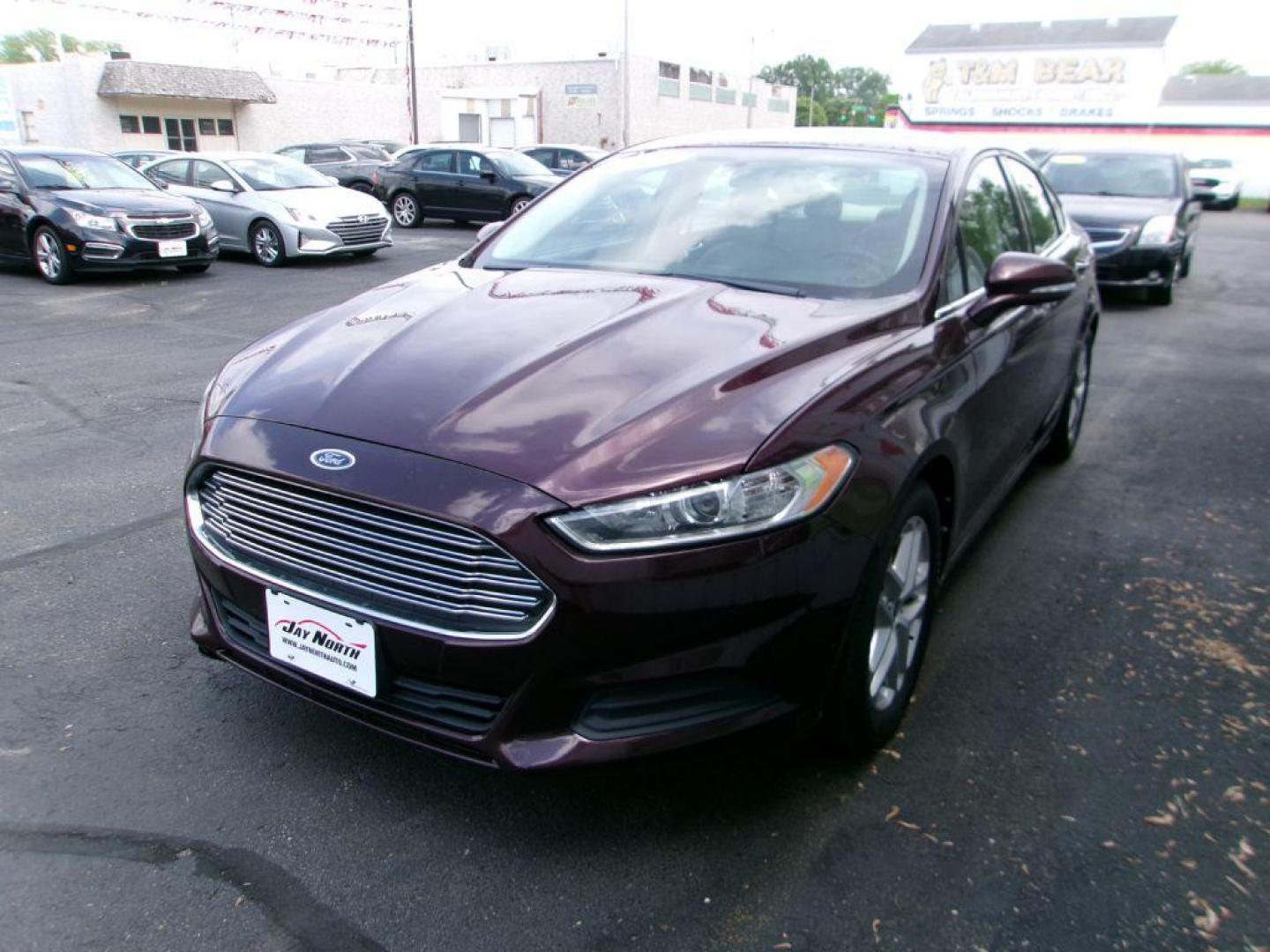 2013 RED FORD FUSION SE (3FA6P0H77DR) with an 2.5L engine, Automatic transmission, located at 501 E. Columbia St., Springfield, OH, 45503, (800) 262-7122, 39.925262, -83.801796 - ***1-Owner***SE***Moonroof***Only 86k Miles***Serviced and Detailed*** Jay North Auto has offered hand picked vehicles since 1965! Our customer's enjoy a NO pressure buying experience with a small town feel. All of our vehicles get fully inspected and detailed. We are a preferred dealer for many - Photo#6