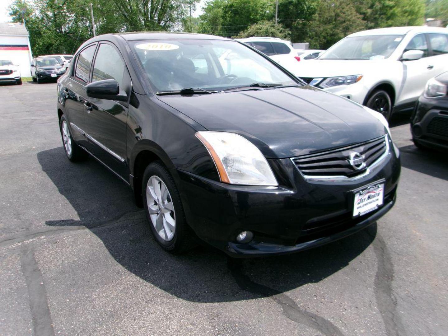 2010 BLACK NISSAN SENTRA 2.0 SL (3N1AB6AP6AL) with an 2.0L engine, Continuously Variable transmission, located at 501 E. Columbia St., Springfield, OH, 45503, (800) 262-7122, 39.925262, -83.801796 - *** Leather *** Moonroof *** 2.0L SL FWD *** Serviced and Detailed *** Well Maintained w/ 31 Service Records on Clean CarFax *** Very Clean *** Jay North Auto has offered hand picked vehicles since 1965! Our customer's enjoy a NO pressure buying experience with a small town feel. All of our ve - Photo#2