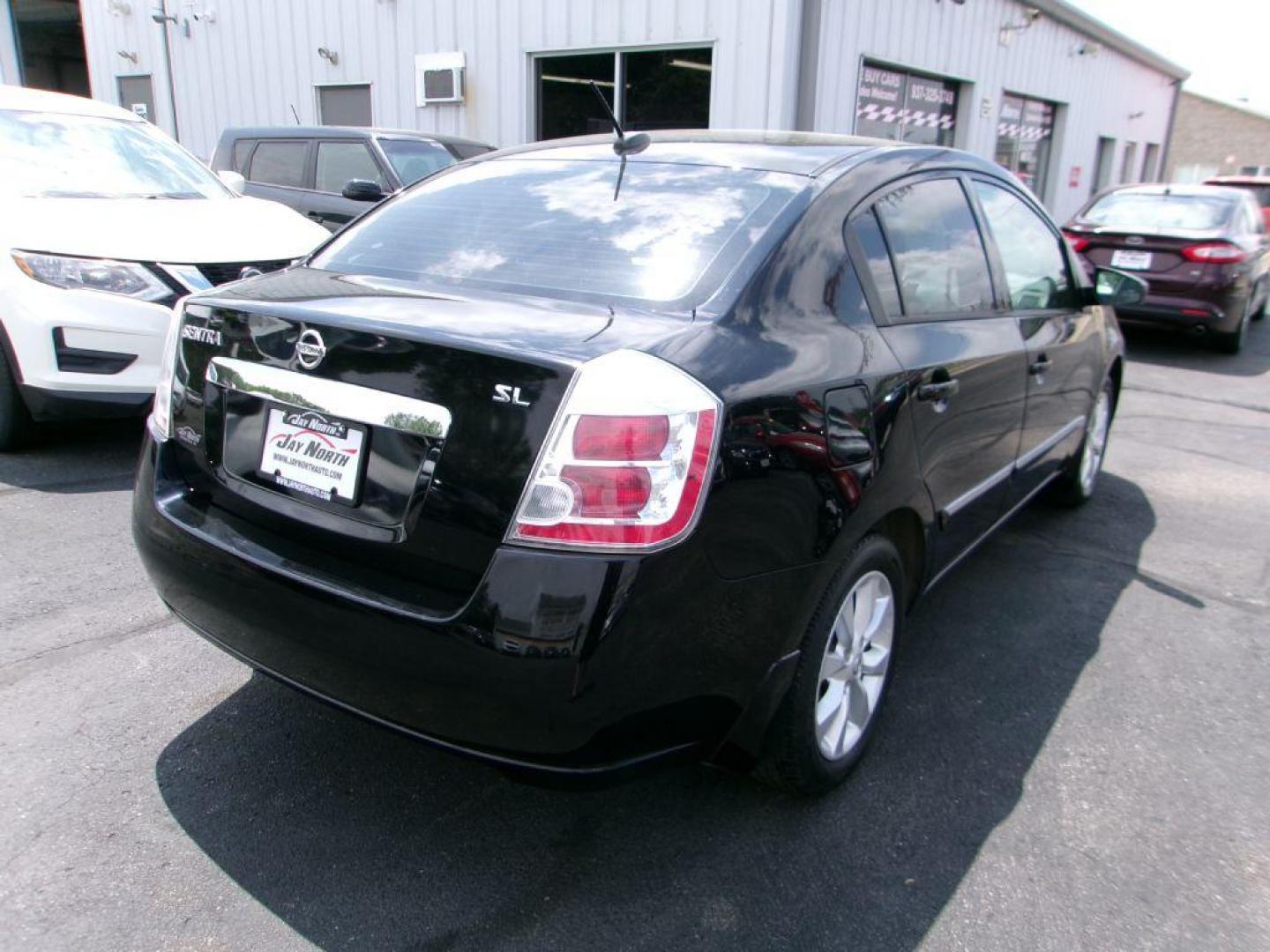 2010 BLACK NISSAN SENTRA 2.0 SL (3N1AB6AP6AL) with an 2.0L engine, Continuously Variable transmission, located at 501 E. Columbia St., Springfield, OH, 45503, (800) 262-7122, 39.925262, -83.801796 - *** Leather *** Moonroof *** 2.0L SL FWD *** Serviced and Detailed *** Well Maintained w/ 31 Service Records on Clean CarFax *** Very Clean *** Jay North Auto has offered hand picked vehicles since 1965! Our customer's enjoy a NO pressure buying experience with a small town feel. All of our ve - Photo#3