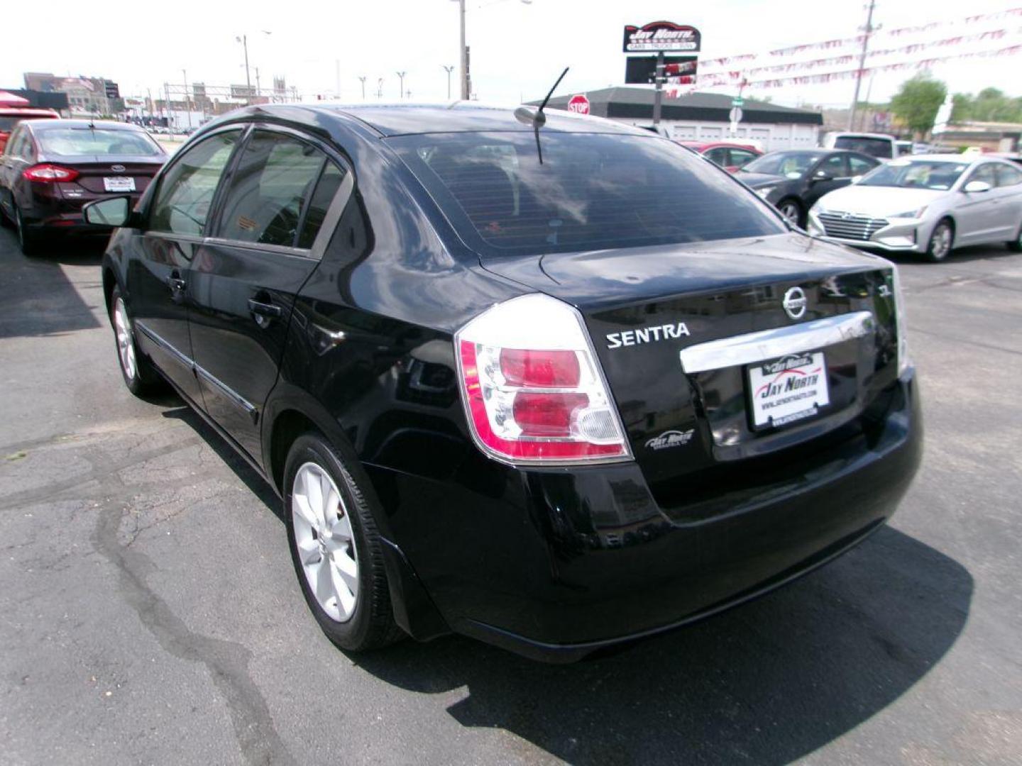 2010 BLACK NISSAN SENTRA 2.0 SL (3N1AB6AP6AL) with an 2.0L engine, Continuously Variable transmission, located at 501 E. Columbia St., Springfield, OH, 45503, (800) 262-7122, 39.925262, -83.801796 - *** Leather *** Moonroof *** 2.0L SL FWD *** Serviced and Detailed *** Well Maintained w/ 31 Service Records on Clean CarFax *** Very Clean *** Jay North Auto has offered hand picked vehicles since 1965! Our customer's enjoy a NO pressure buying experience with a small town feel. All of our ve - Photo#5