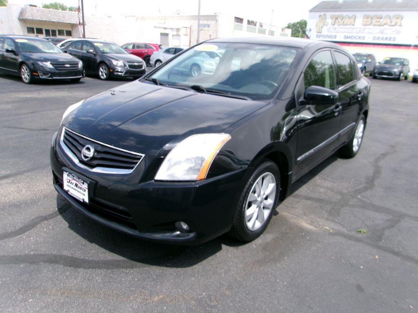 2010 BLACK NISSAN SENTRA 2.0 SL (3N1AB6AP6AL) with an 2.0L engine, Continuously Variable transmission, located at 501 E. Columbia St., Springfield, OH, 45503, (800) 262-7122, 39.925262, -83.801796 - *** Leather *** Moonroof *** 2.0L SL FWD *** Serviced and Detailed *** Well Maintained w/ 31 Service Records on Clean CarFax *** Very Clean *** Jay North Auto has offered hand picked vehicles since 1965! Our customer's enjoy a NO pressure buying experience with a small town feel. All of our ve - Photo#6