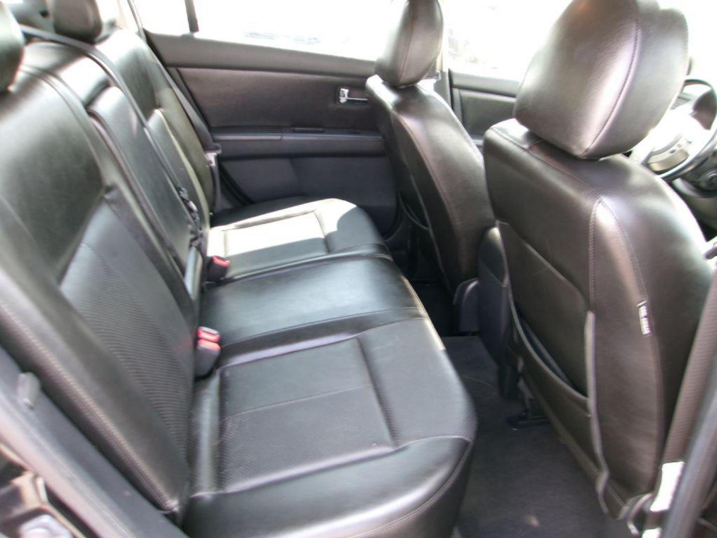 2010 BLACK NISSAN SENTRA 2.0 SL (3N1AB6AP6AL) with an 2.0L engine, Continuously Variable transmission, located at 501 E. Columbia St., Springfield, OH, 45503, (800) 262-7122, 39.925262, -83.801796 - *** Leather *** Moonroof *** 2.0L SL FWD *** Serviced and Detailed *** Well Maintained w/ 31 Service Records on Clean CarFax *** Very Clean *** Jay North Auto has offered hand picked vehicles since 1965! Our customer's enjoy a NO pressure buying experience with a small town feel. All of our ve - Photo#15