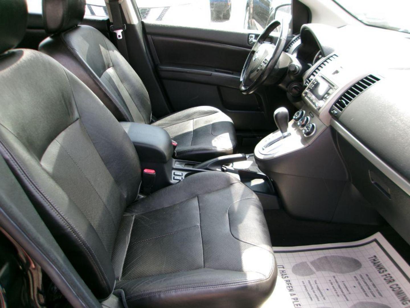 2010 BLACK NISSAN SENTRA 2.0 SL (3N1AB6AP6AL) with an 2.0L engine, Continuously Variable transmission, located at 501 E. Columbia St., Springfield, OH, 45503, (800) 262-7122, 39.925262, -83.801796 - *** Leather *** Moonroof *** 2.0L SL FWD *** Serviced and Detailed *** Well Maintained w/ 31 Service Records on Clean CarFax *** Very Clean *** Jay North Auto has offered hand picked vehicles since 1965! Our customer's enjoy a NO pressure buying experience with a small town feel. All of our ve - Photo#17
