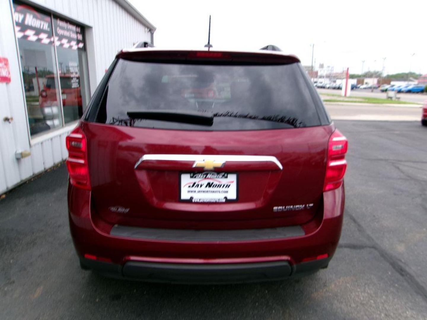 2016 RED CHEVROLET EQUINOX LT (2GNALCEK5G6) with an 2.4L engine, Automatic transmission, located at 501 E. Columbia St., Springfield, OH, 45503, (800) 262-7122, 39.925262, -83.801796 - ***New Timing***New Front and Rear Pads and Rotors***New Spark Plugs***Serviced and Detailed*** Jay North Auto has offered hand picked vehicles since 1965! Our customer's enjoy a NO pressure buying experience with a small town feel. All of our vehicles get fully inspected and detailed. We are a - Photo#4