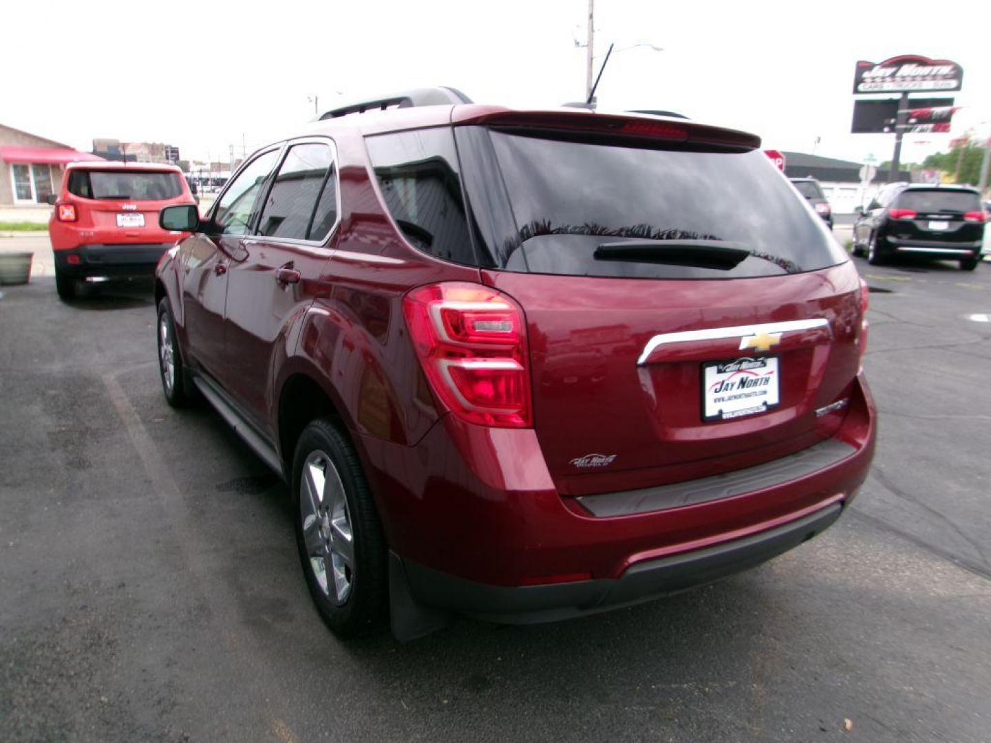 2016 RED CHEVROLET EQUINOX LT (2GNALCEK5G6) with an 2.4L engine, Automatic transmission, located at 501 E. Columbia St., Springfield, OH, 45503, (800) 262-7122, 39.925262, -83.801796 - ***New Timing***New Front and Rear Pads and Rotors***New Spark Plugs***Serviced and Detailed*** Jay North Auto has offered hand picked vehicles since 1965! Our customer's enjoy a NO pressure buying experience with a small town feel. All of our vehicles get fully inspected and detailed. We are a - Photo#5