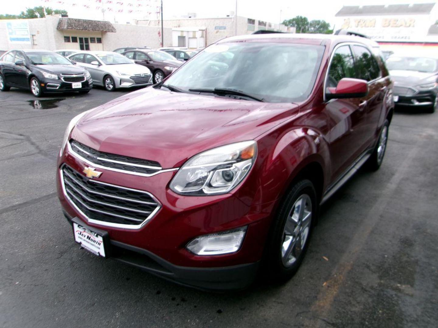 2016 RED CHEVROLET EQUINOX LT (2GNALCEK5G6) with an 2.4L engine, Automatic transmission, located at 501 E. Columbia St., Springfield, OH, 45503, (800) 262-7122, 39.925262, -83.801796 - ***New Timing***New Front and Rear Pads and Rotors***New Spark Plugs***Serviced and Detailed*** Jay North Auto has offered hand picked vehicles since 1965! Our customer's enjoy a NO pressure buying experience with a small town feel. All of our vehicles get fully inspected and detailed. We are a - Photo#6