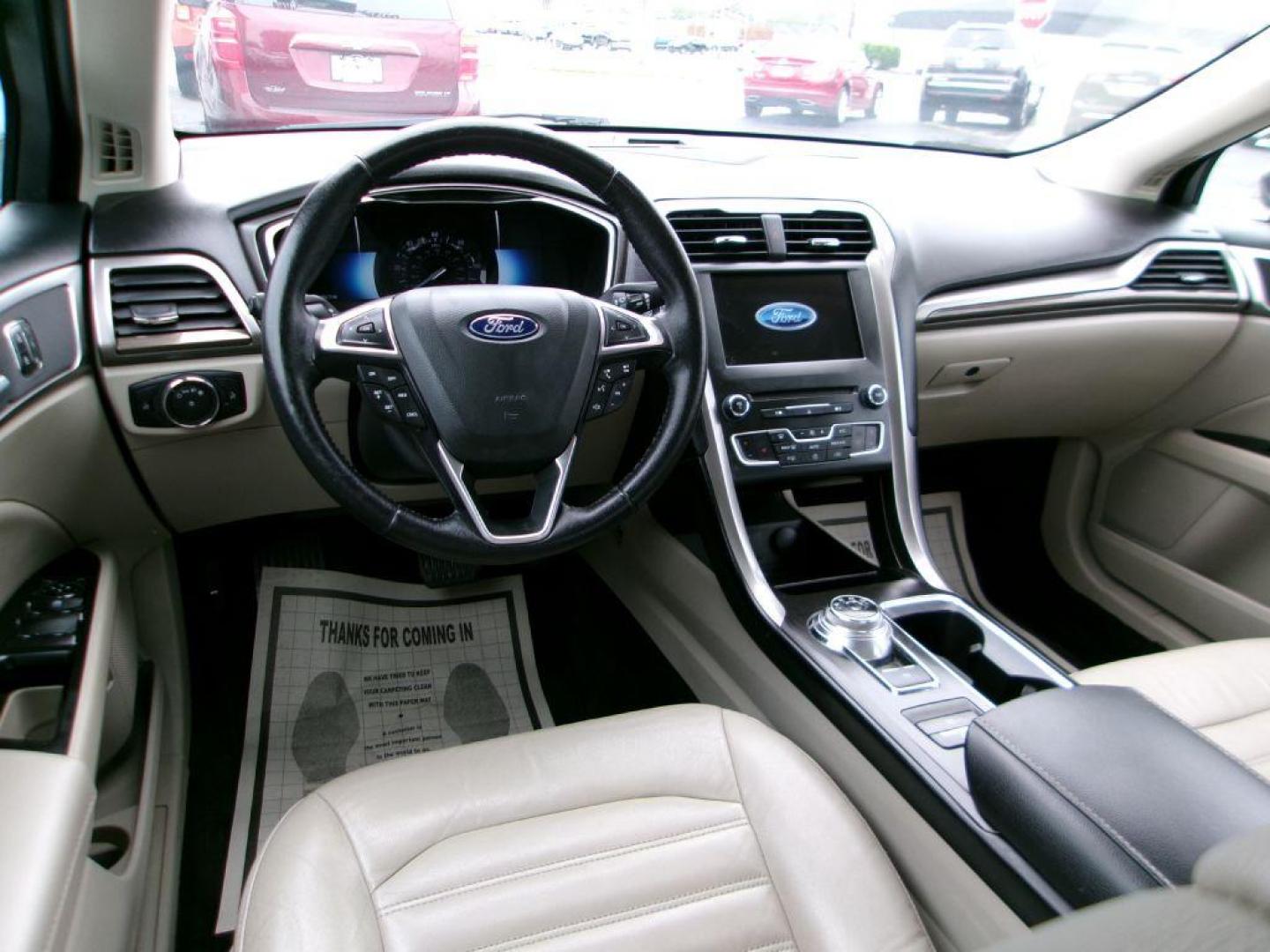 2018 GRAY FORD FUSION SE HYBRID (3FA6P0LU5JR) with an 2.0L engine, Continuously Variable transmission, located at 501 E. Columbia St., Springfield, OH, 45503, (800) 262-7122, 39.925262, -83.801796 - *** Leather *** Back Up Camera *** SE Hybrid *** Serviced and Detailed *** Clean CarFax with 21 Service Records *** Alloy Wheels *** Jay North Auto has offered hand picked vehicles since 1965! Our customer's enjoy a NO pressure buying experience with a small town feel. All of our vehicles get f - Photo#9