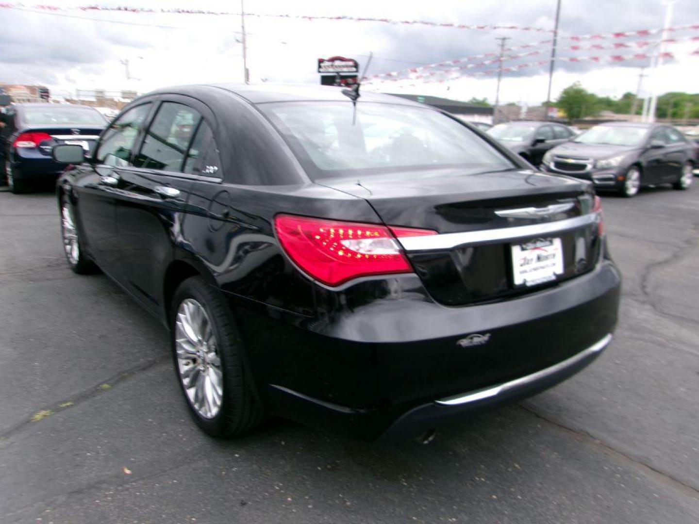 2013 BLACK CHRYSLER 200 LIMITED (1C3CCBCG9DN) with an 3.6L engine, Automatic transmission, located at 501 E. Columbia St., Springfield, OH, 45503, (800) 262-7122, 39.925262, -83.801796 - *** New Battery *** New Brakes *** Serviced and Detailed *** Limited V6 *** Leather *** Clean CarFax w/ many service records *** Jay North Auto has offered hand picked vehicles since 1965! Our customer's enjoy a NO pressure buying experience with a small town feel. All of our vehicles get fully - Photo#5