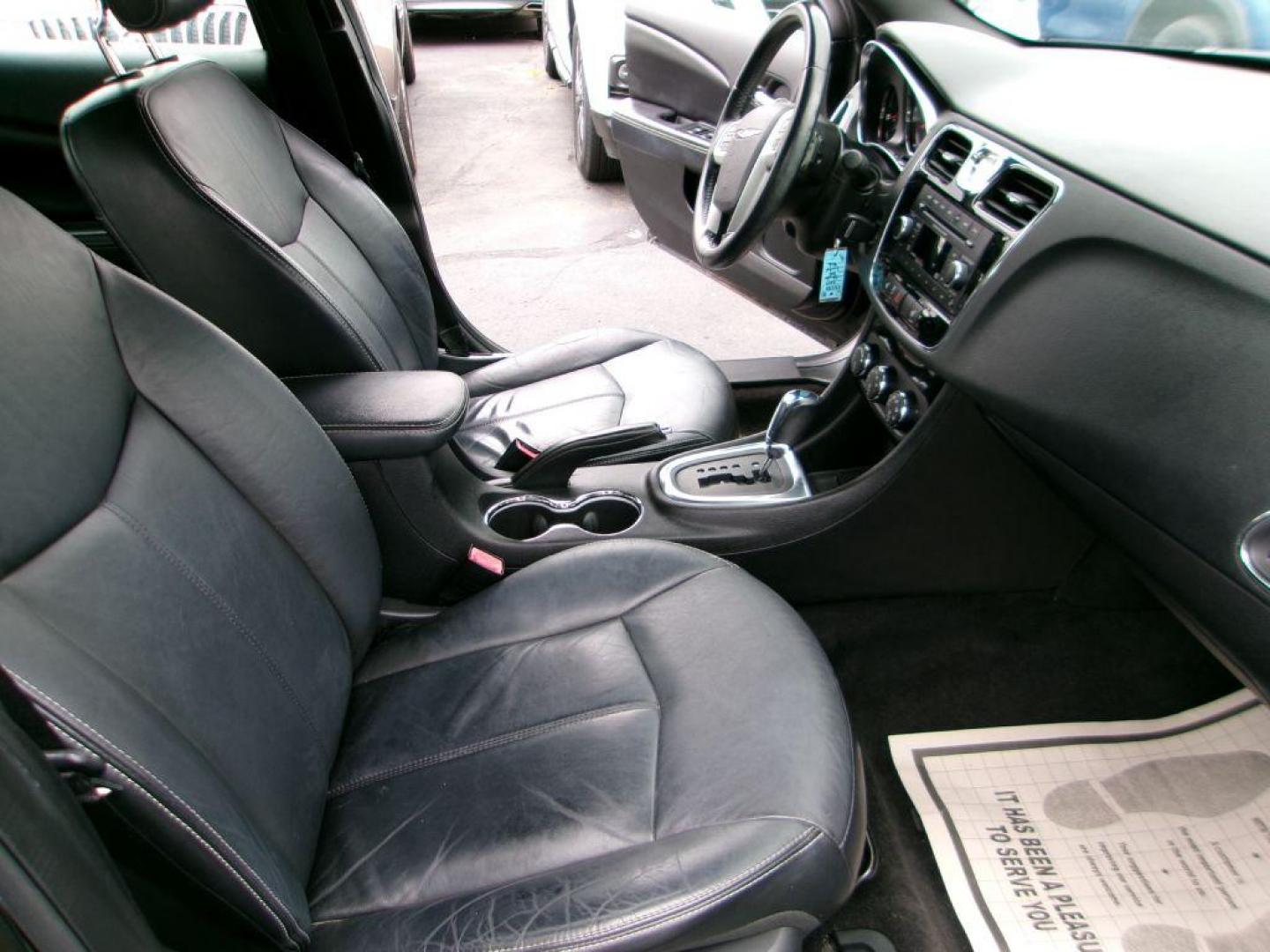 2013 BLACK CHRYSLER 200 LIMITED (1C3CCBCG9DN) with an 3.6L engine, Automatic transmission, located at 501 E. Columbia St., Springfield, OH, 45503, (800) 262-7122, 39.925262, -83.801796 - *** New Battery *** New Brakes *** Serviced and Detailed *** Limited V6 *** Leather *** Clean CarFax w/ many service records *** Jay North Auto has offered hand picked vehicles since 1965! Our customer's enjoy a NO pressure buying experience with a small town feel. All of our vehicles get fully - Photo#16
