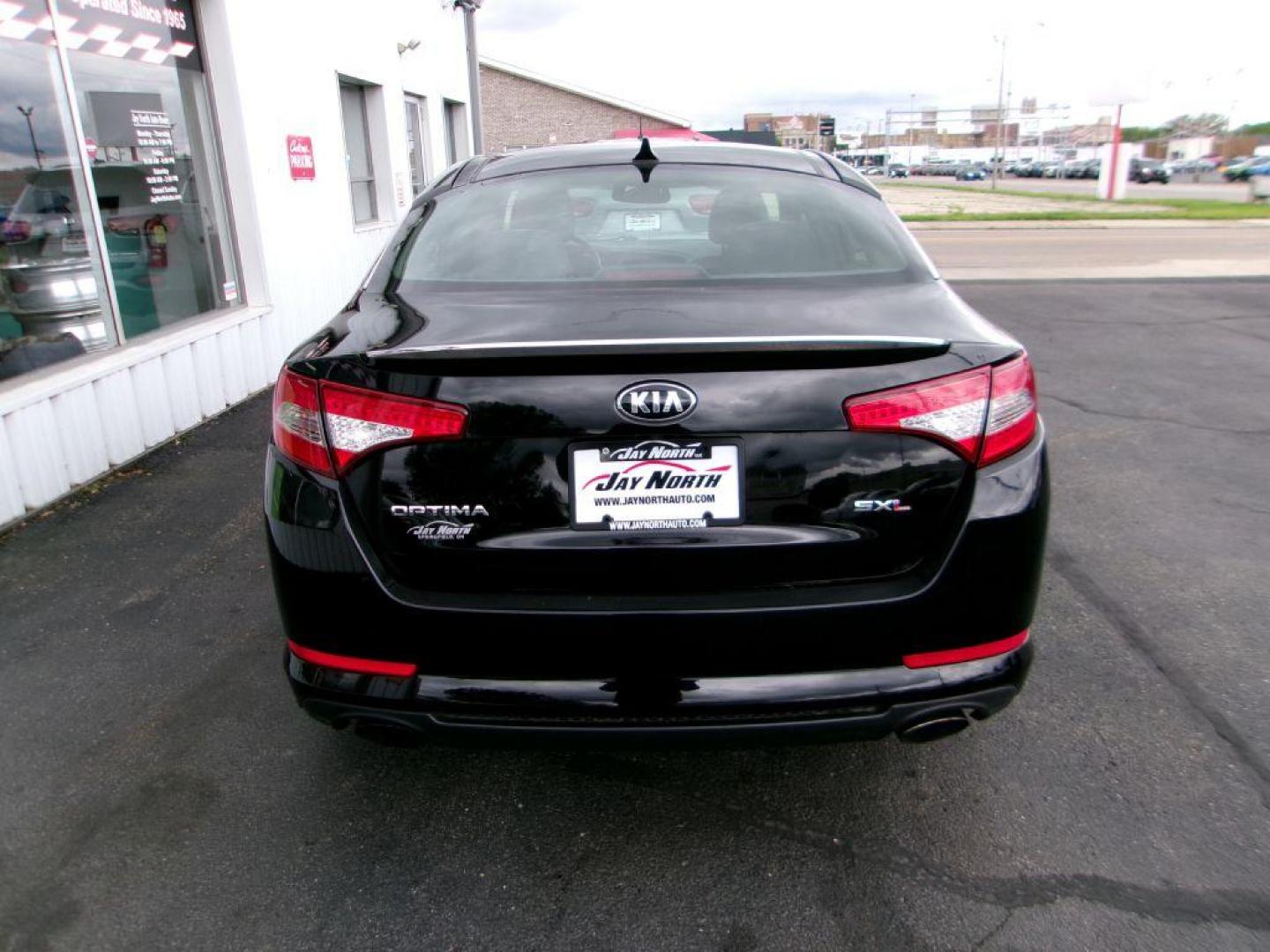 2013 BLACK KIA OPTIMA SXL (5XXGR4A6XDG) , Automatic transmission, located at 501 E. Columbia St., Springfield, OH, 45503, (800) 262-7122, 39.925262, -83.801796 - *** Local Trade *** Serviced and Detailed *** Loaded *** SX Premium Touring Package- Panoramic Sunroof- Power Folding Outside Mirrors- Infinity Audio System- UVO Powered by Microsoft- HD Radio Technology- Rear Camera Display- Power Front Passenger's Seat- Driver's Seat Memory- Heated and Cooled Fron - Photo#4