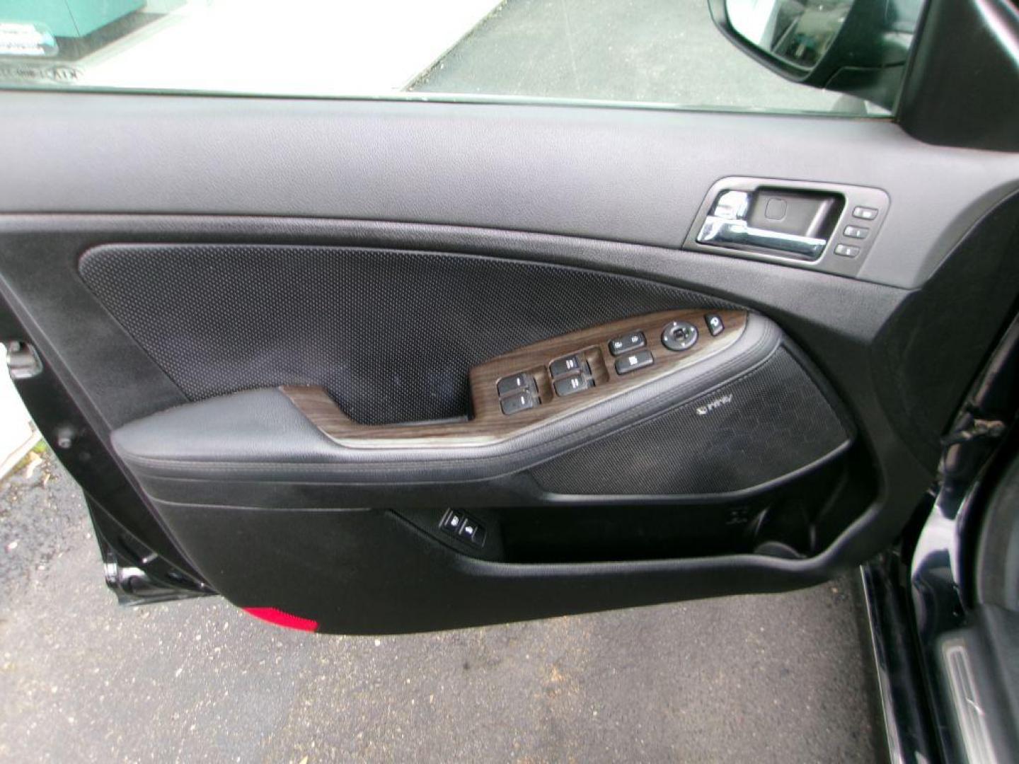 2013 BLACK KIA OPTIMA SXL (5XXGR4A6XDG) , Automatic transmission, located at 501 E. Columbia St., Springfield, OH, 45503, (800) 262-7122, 39.925262, -83.801796 - *** Local Trade *** Serviced and Detailed *** Loaded *** SX Premium Touring Package- Panoramic Sunroof- Power Folding Outside Mirrors- Infinity Audio System- UVO Powered by Microsoft- HD Radio Technology- Rear Camera Display- Power Front Passenger's Seat- Driver's Seat Memory- Heated and Cooled Fron - Photo#7