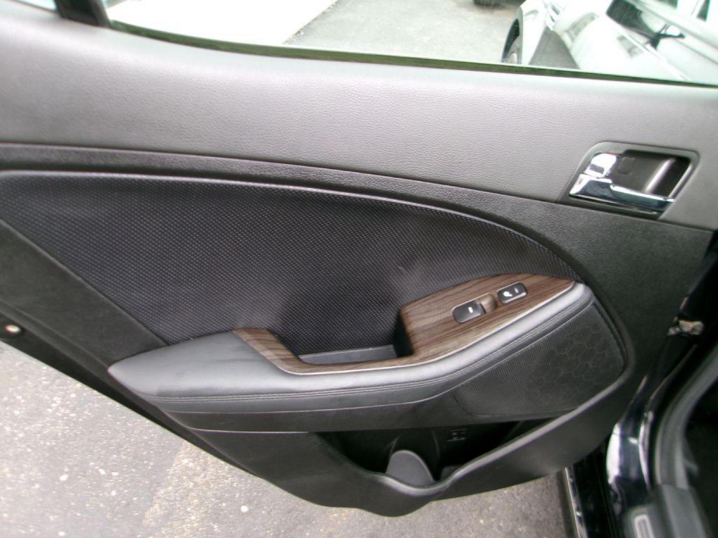 2013 BLACK KIA OPTIMA SXL (5XXGR4A6XDG) , Automatic transmission, located at 501 E. Columbia St., Springfield, OH, 45503, (800) 262-7122, 39.925262, -83.801796 - *** Local Trade *** Serviced and Detailed *** Loaded *** SX Premium Touring Package- Panoramic Sunroof- Power Folding Outside Mirrors- Infinity Audio System- UVO Powered by Microsoft- HD Radio Technology- Rear Camera Display- Power Front Passenger's Seat- Driver's Seat Memory- Heated and Cooled Fron - Photo#11