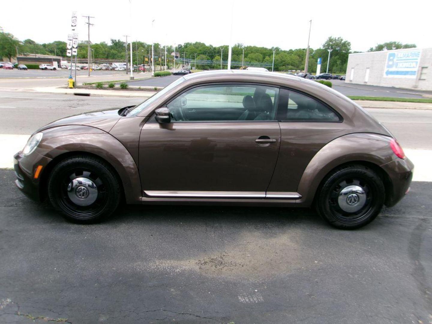 2012 BROWN VOLKSWAGEN BEETLE 2.5 (3VWJP7AT3CM) with an 2.5L engine, Automatic transmission, located at 501 E. Columbia St., Springfield, OH, 45503, (800) 262-7122, 39.925262, -83.801796 - *** Serviced and Detailed *** 2.5L *** Power Windows and Locks *** NICE!!! *** Jay North Auto has offered hand picked vehicles since 1965! Our customer's enjoy a NO pressure buying experience with a small town feel. All of our vehicles get fully inspected and detailed. We are a preferred dealer - Photo#1