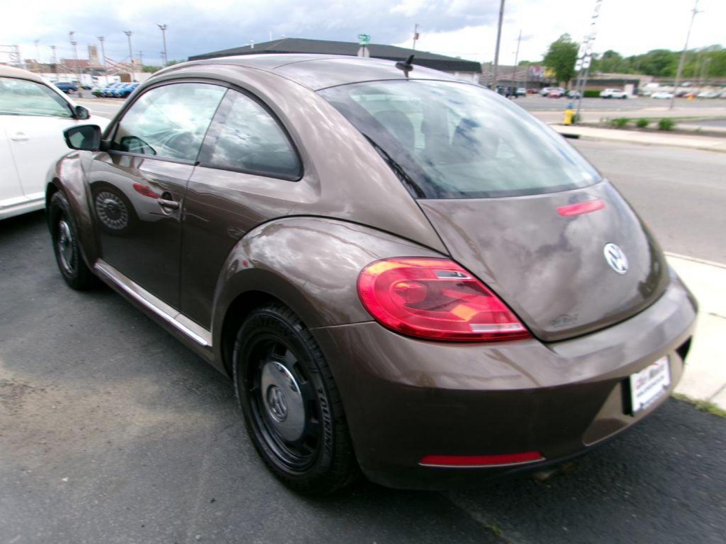 2012 BROWN VOLKSWAGEN BEETLE 2.5 (3VWJP7AT3CM) with an 2.5L engine, Automatic transmission, located at 501 E. Columbia St., Springfield, OH, 45503, (800) 262-7122, 39.925262, -83.801796 - *** Serviced and Detailed *** 2.5L *** Power Windows and Locks *** NICE!!! *** Jay North Auto has offered hand picked vehicles since 1965! Our customer's enjoy a NO pressure buying experience with a small town feel. All of our vehicles get fully inspected and detailed. We are a preferred dealer - Photo#2