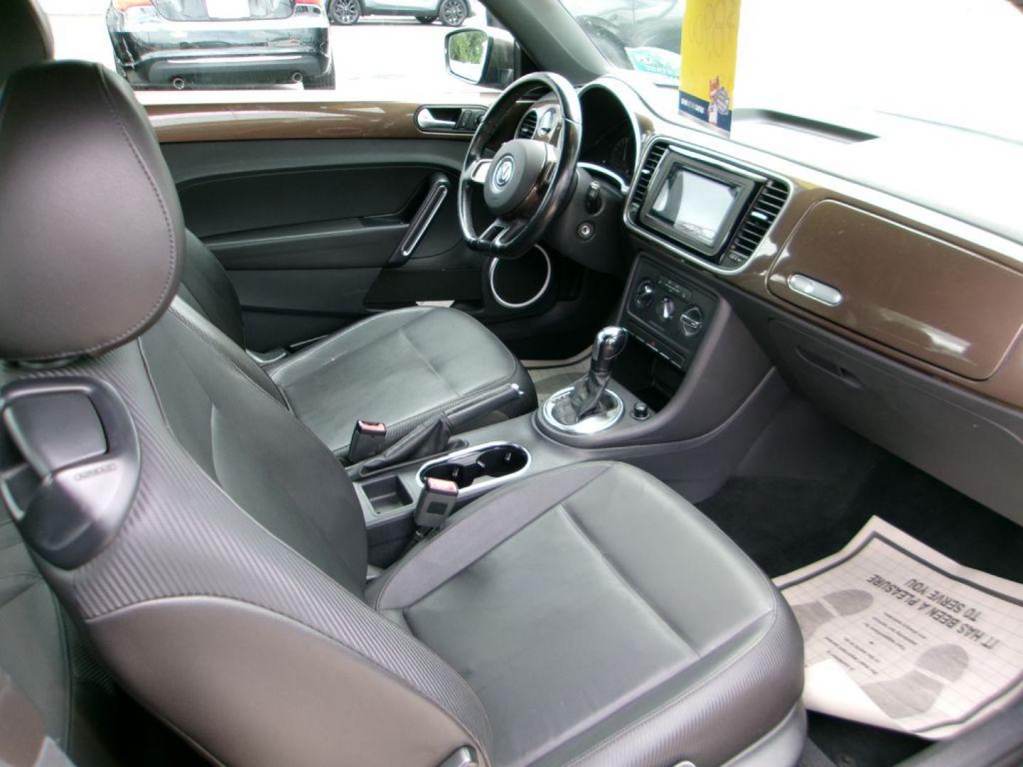 2012 BROWN VOLKSWAGEN BEETLE 2.5 (3VWJP7AT3CM) with an 2.5L engine, Automatic transmission, located at 501 E. Columbia St., Springfield, OH, 45503, (800) 262-7122, 39.925262, -83.801796 - *** Serviced and Detailed *** 2.5L *** Power Windows and Locks *** NICE!!! *** Jay North Auto has offered hand picked vehicles since 1965! Our customer's enjoy a NO pressure buying experience with a small town feel. All of our vehicles get fully inspected and detailed. We are a preferred dealer - Photo#6