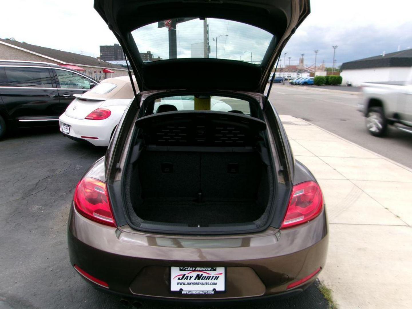 2012 BROWN VOLKSWAGEN BEETLE 2.5 (3VWJP7AT3CM) with an 2.5L engine, Automatic transmission, located at 501 E. Columbia St., Springfield, OH, 45503, (800) 262-7122, 39.925262, -83.801796 - *** Serviced and Detailed *** 2.5L *** Power Windows and Locks *** NICE!!! *** Jay North Auto has offered hand picked vehicles since 1965! Our customer's enjoy a NO pressure buying experience with a small town feel. All of our vehicles get fully inspected and detailed. We are a preferred dealer - Photo#8
