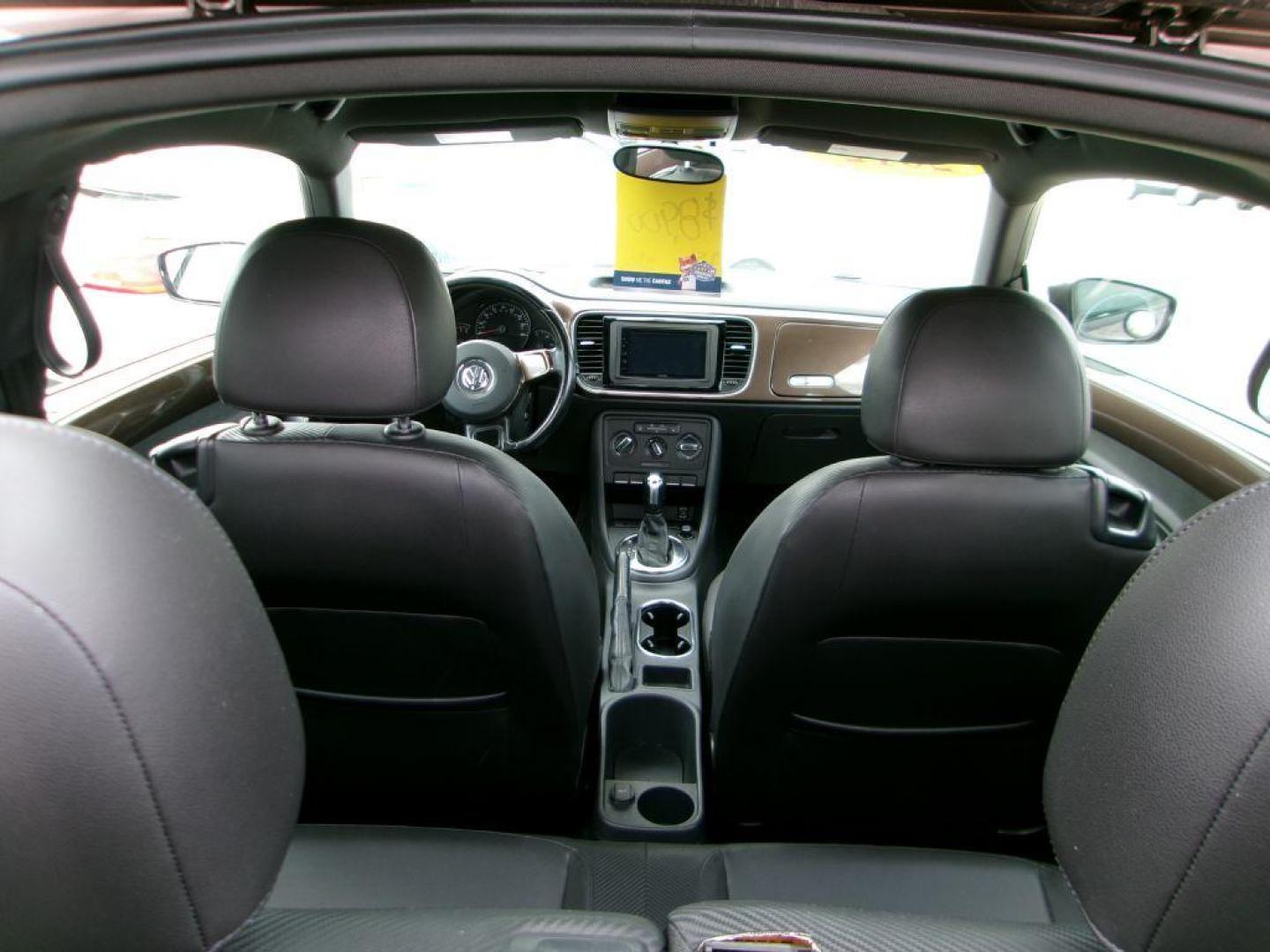 2012 BROWN VOLKSWAGEN BEETLE 2.5 (3VWJP7AT3CM) with an 2.5L engine, Automatic transmission, located at 501 E. Columbia St., Springfield, OH, 45503, (800) 262-7122, 39.925262, -83.801796 - *** Serviced and Detailed *** 2.5L *** Power Windows and Locks *** NICE!!! *** Jay North Auto has offered hand picked vehicles since 1965! Our customer's enjoy a NO pressure buying experience with a small town feel. All of our vehicles get fully inspected and detailed. We are a preferred dealer - Photo#9