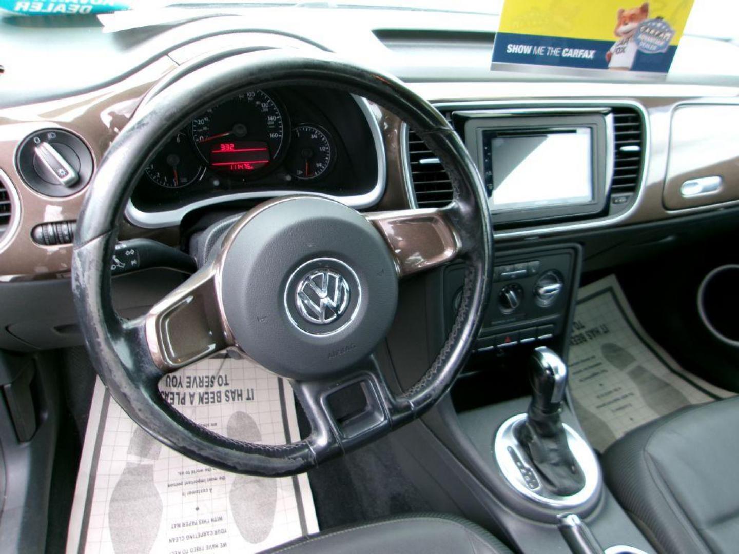 2012 BROWN VOLKSWAGEN BEETLE 2.5 (3VWJP7AT3CM) with an 2.5L engine, Automatic transmission, located at 501 E. Columbia St., Springfield, OH, 45503, (800) 262-7122, 39.925262, -83.801796 - *** Serviced and Detailed *** 2.5L *** Power Windows and Locks *** NICE!!! *** Jay North Auto has offered hand picked vehicles since 1965! Our customer's enjoy a NO pressure buying experience with a small town feel. All of our vehicles get fully inspected and detailed. We are a preferred dealer - Photo#11